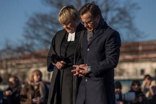 Swedish prime minister Ulf Kristersson and his wife Birgitta Ed lay flowers at the memorial site near the school to honor the victims of the previous day's attack on 5 February 2025 in Orebro, Sweden