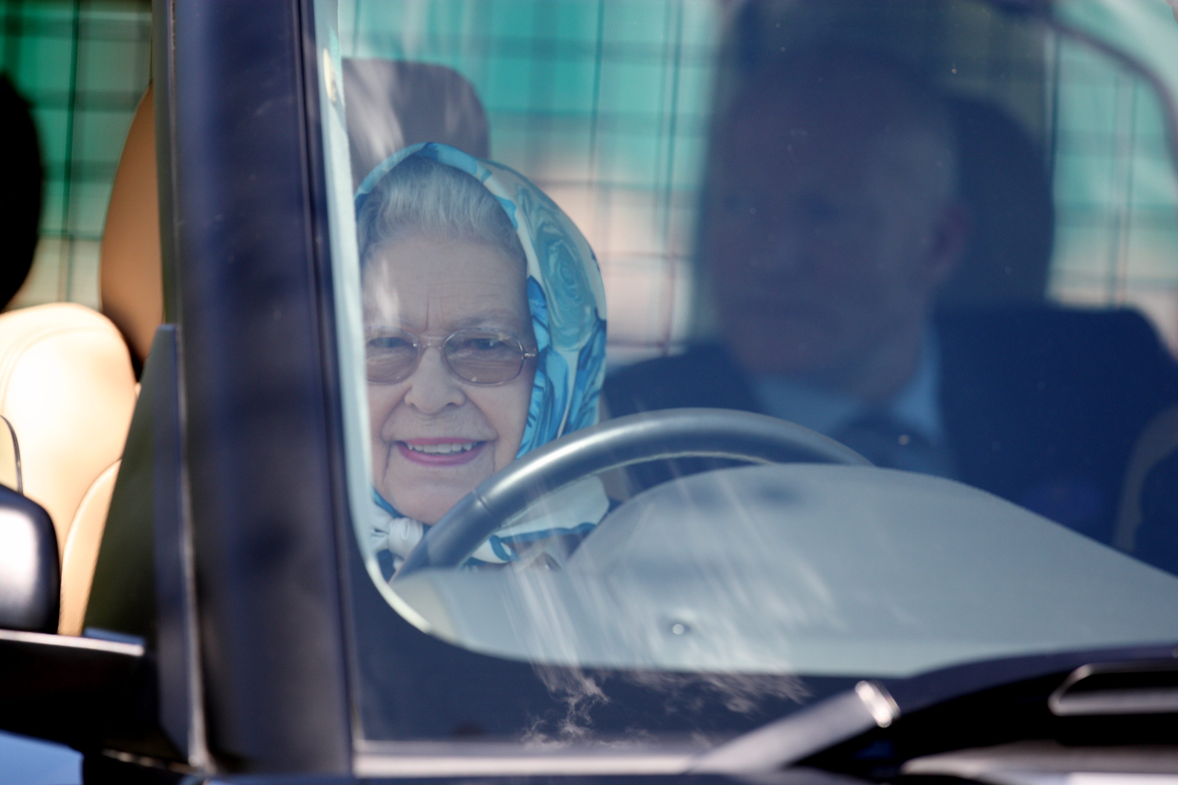 Queen Elizabeth II watches the Land Rover International Driving Grand Prix at Windsor Castle (Steve Parsons/PA)