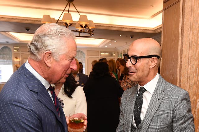 The then Prince of Wales shakes hands with Stanley Tucci at the annual Fortnum & Mason Food and Drink Awards at Fortnum & Mason, central London (Jeff Spicer/PA)