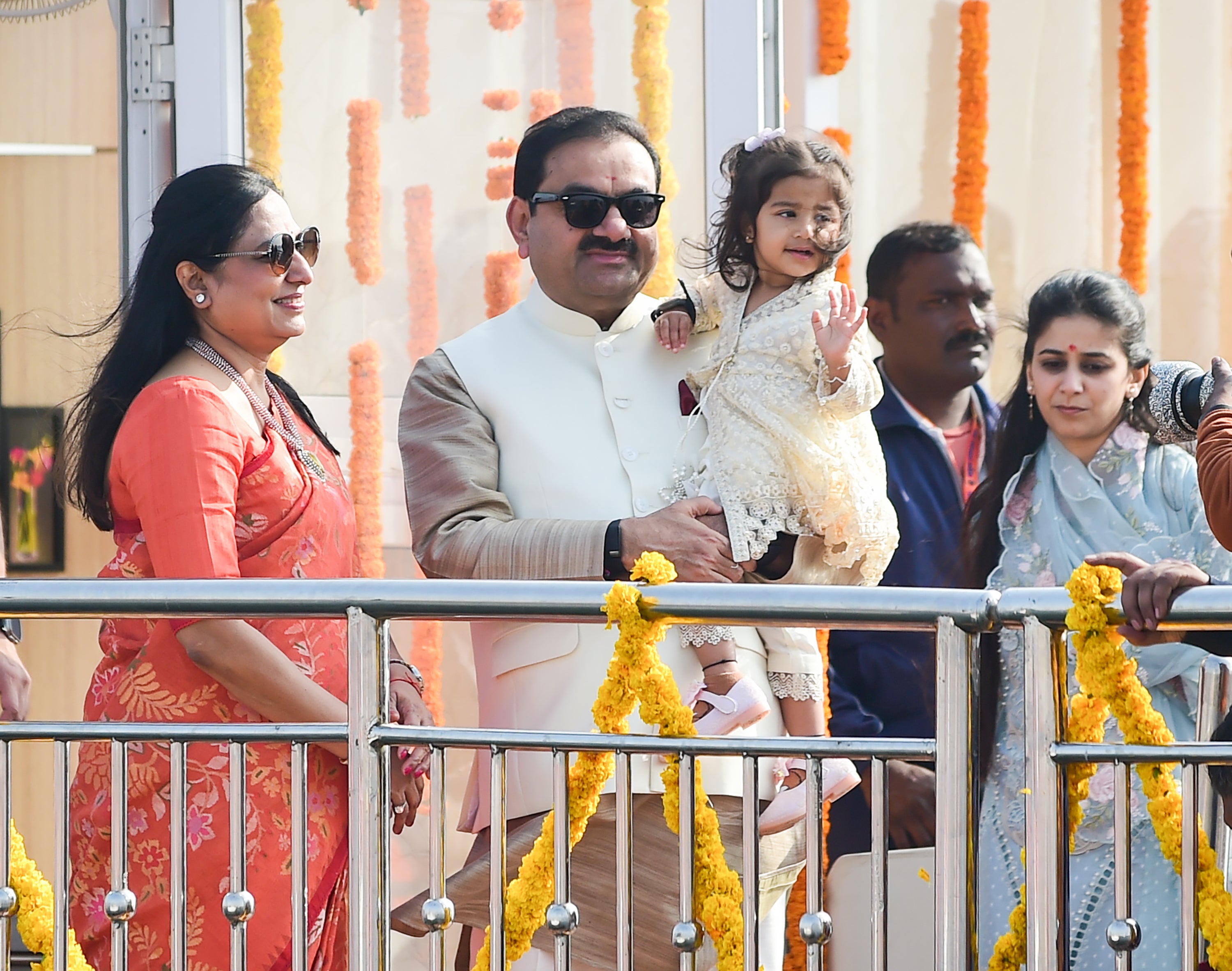 Gautam Adani, centre, with his wife Priti Adani and granddaughter at the Maha Kumbh Mela in January 2025