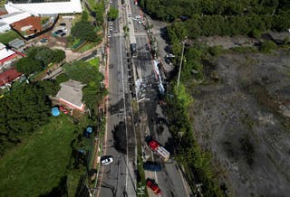 A drone view of the site where a small plane crashed into vehicles on Marques de Sao Vicente Avenue in Sao Paulo, Brazil
