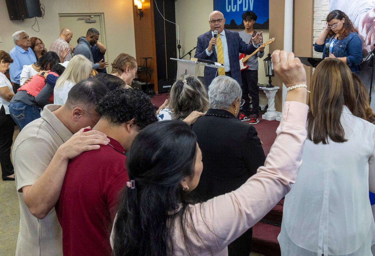 Latino churches lock their doors amid Trump immigration raid fears