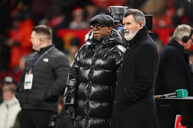 <p>ITV pundits Ian Wright and Roy Keane watch on at Old Trafford</p>