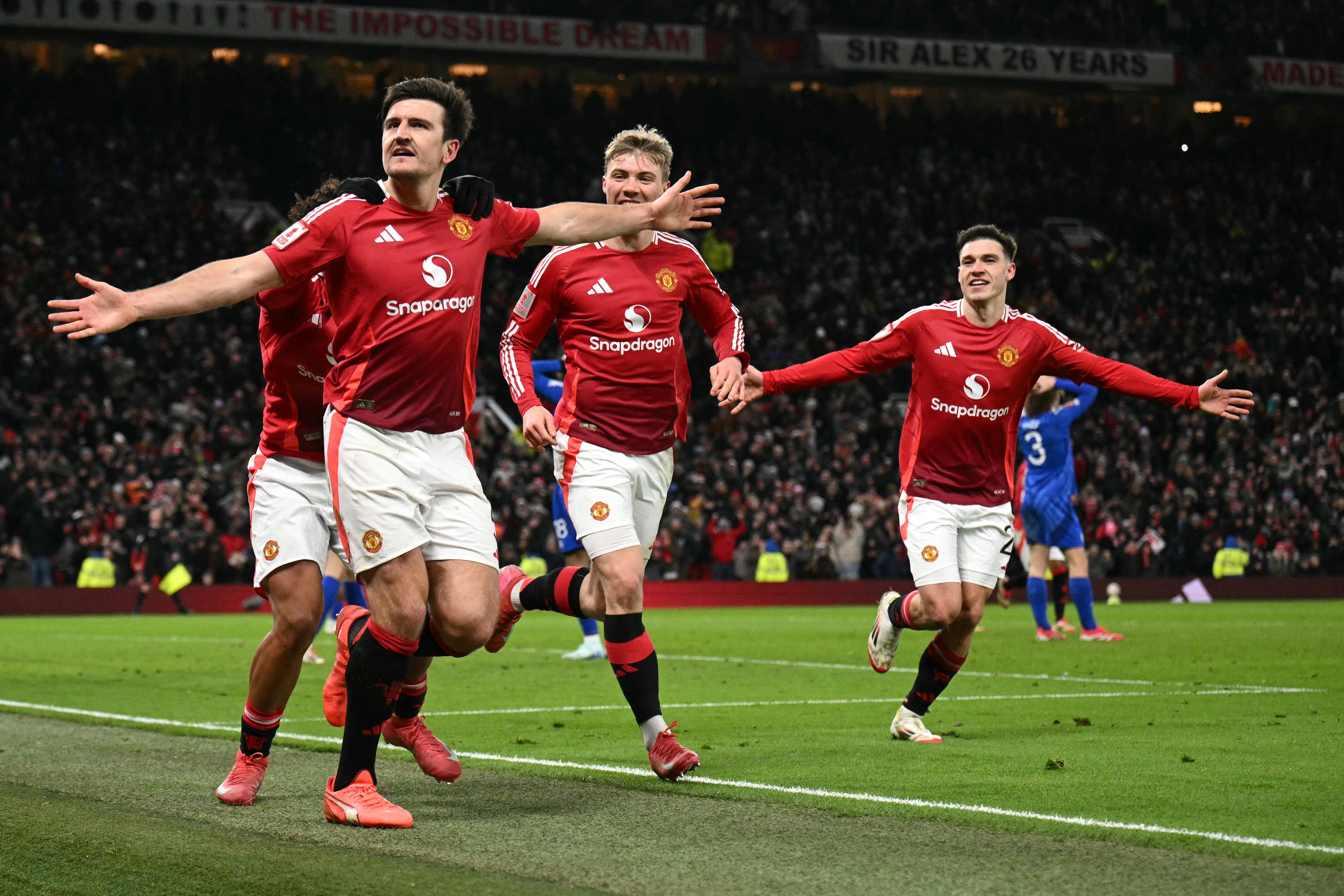 Harry Maguire celebrates after scoring Manchester United's winner