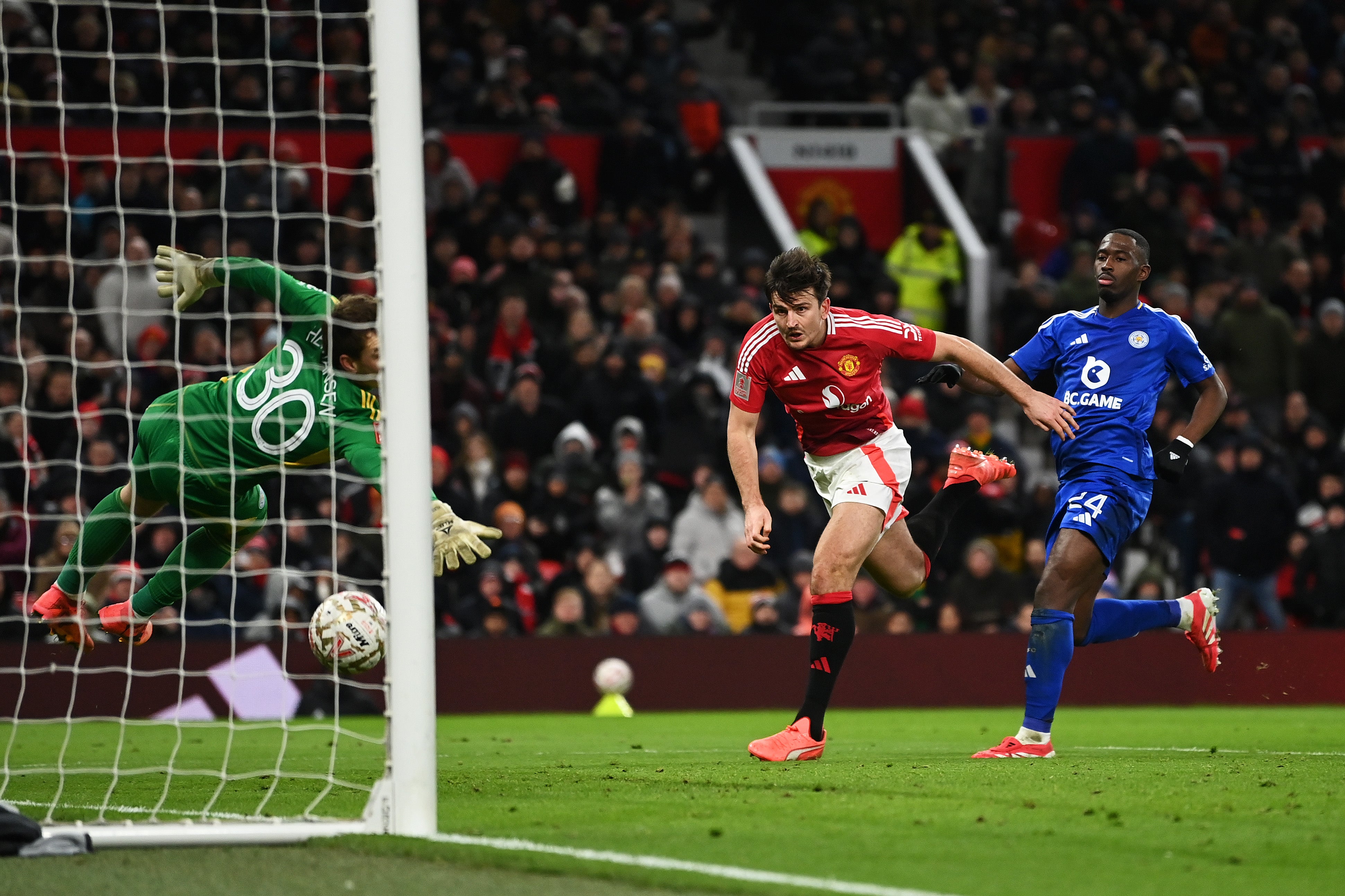 Harry Maguire heads home United's winner