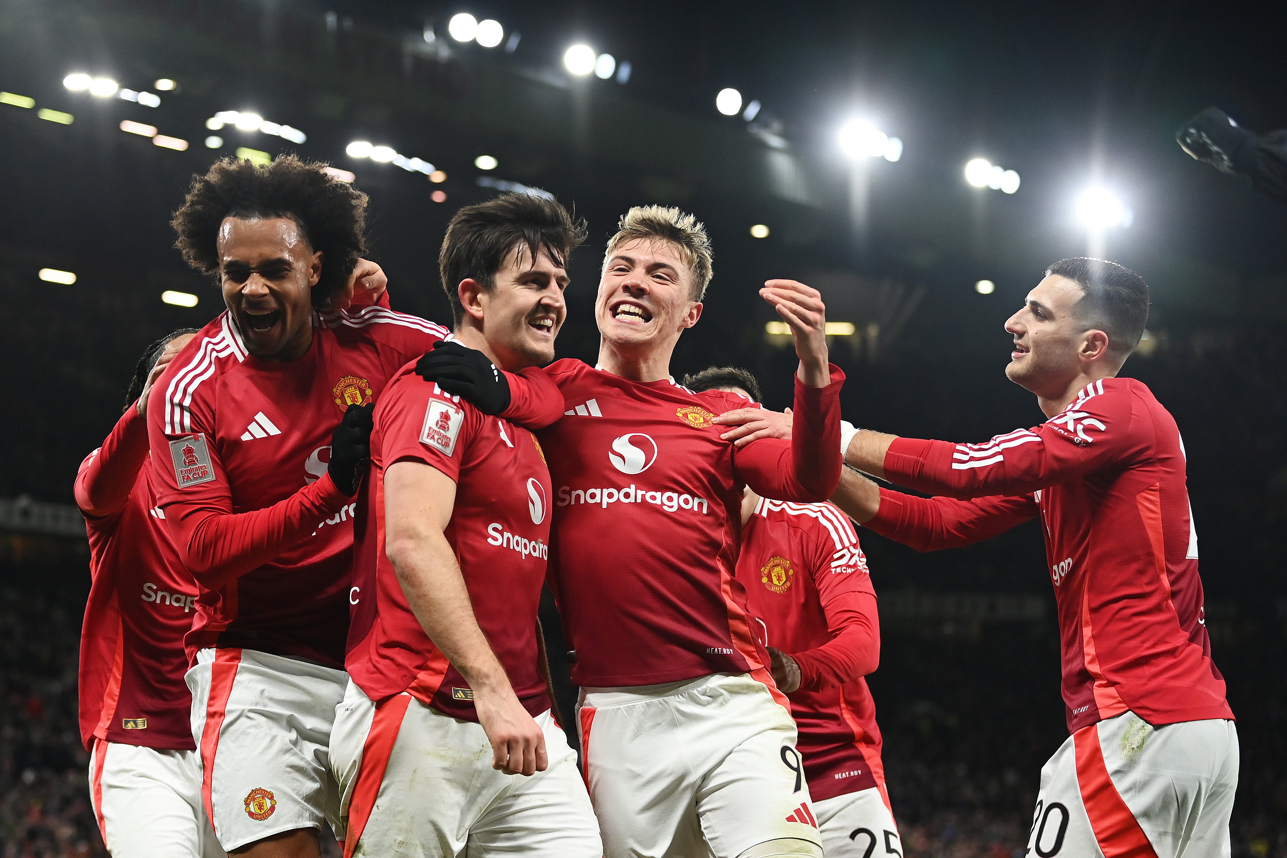 United celebrate Maguire's late goal