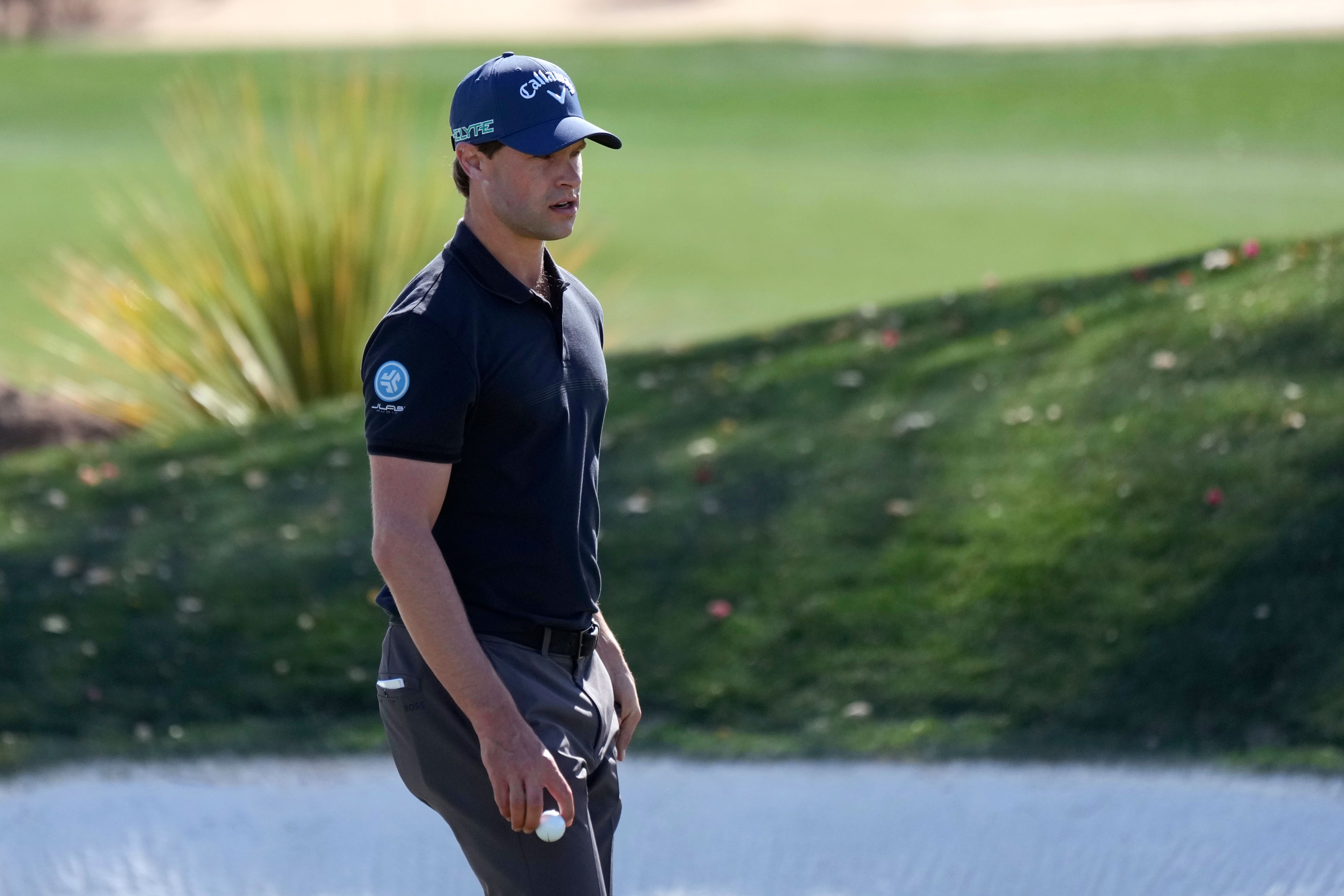 Thomas Detry, of Belgium, walks off the green after making par on the 12th hole during the second round of Phoenix Open (AP Photo/Ross D. Franklin)