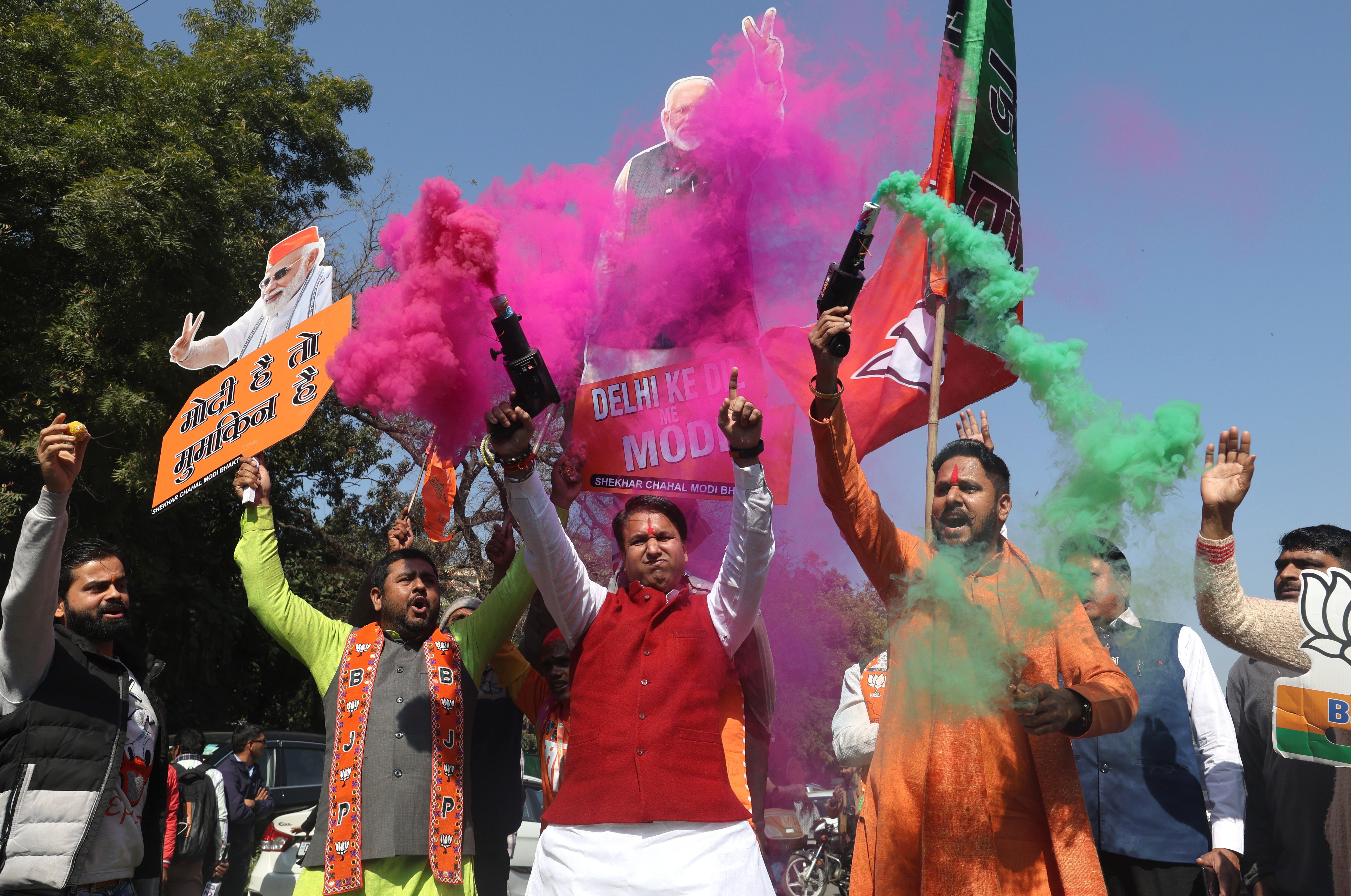 Bharatiya Janata Party (BJP) party workers celebrate the party's lead in votes for the Delhi Assembly elections, at the party headquarters in New Delhi, India, 08 February 2025