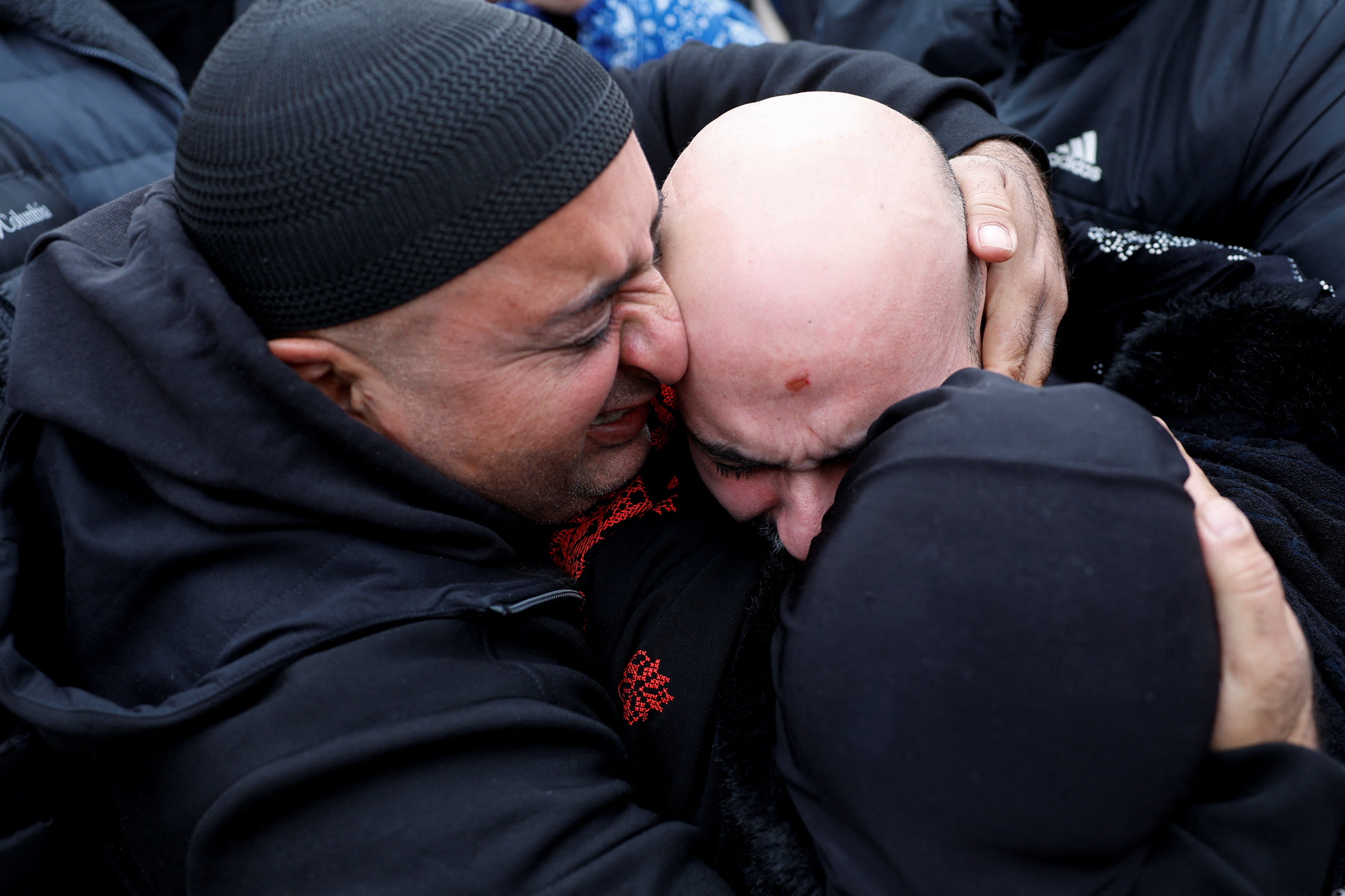 A freed Palestinian prisoner is greeted after being released from an Israeli jail