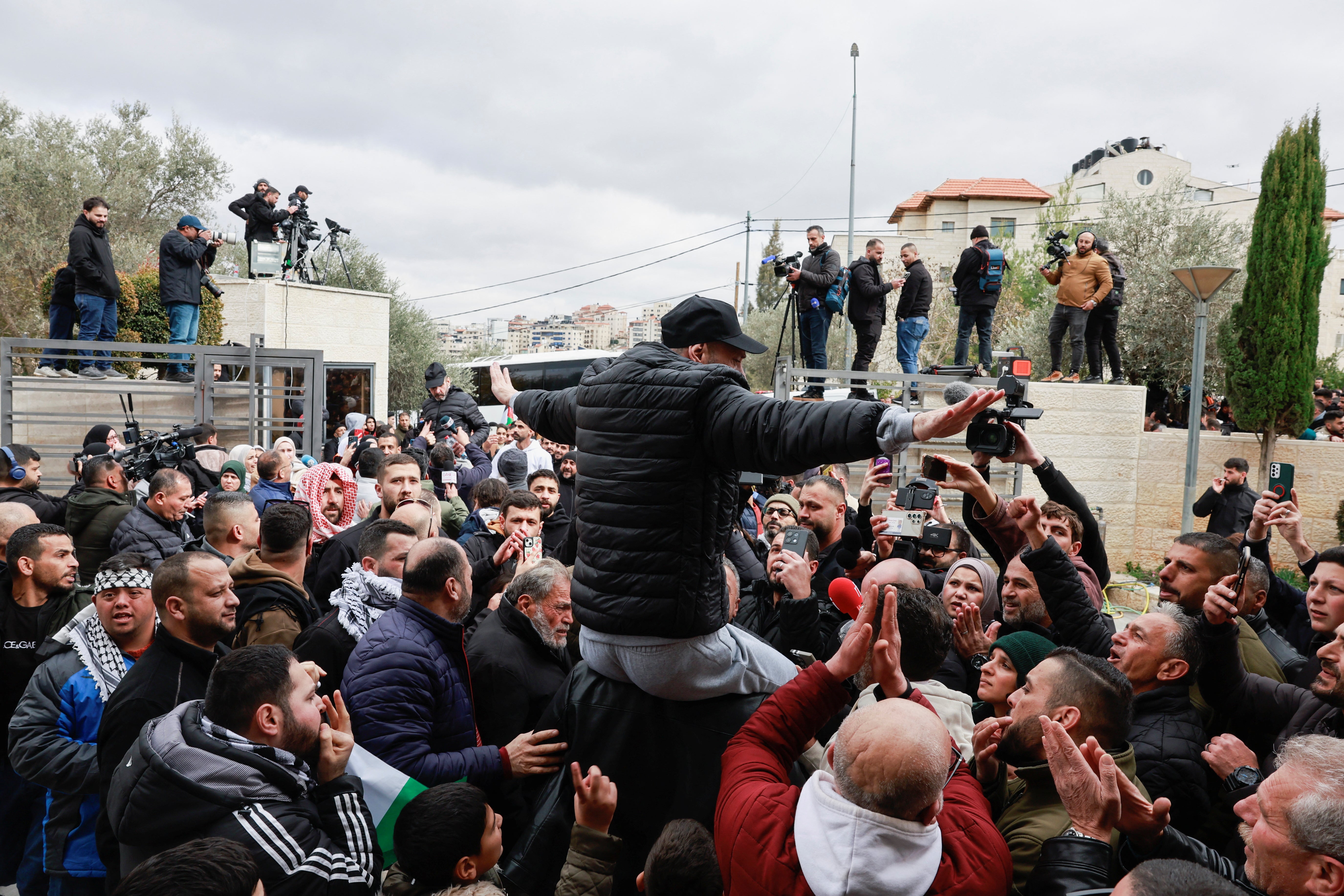 A freed Palestinian prisoner is greeted in the West Bank after being released from an Israeli jail on 8 February