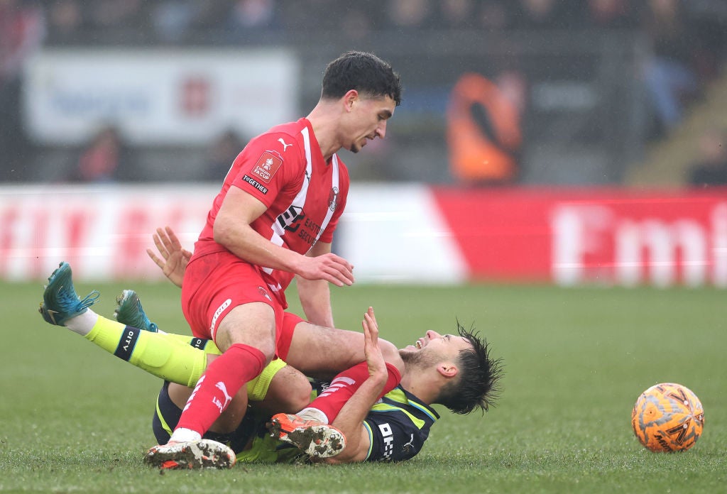 Gonzalez goes down following the challenge from Leyton Orient’s Sonny Perkins