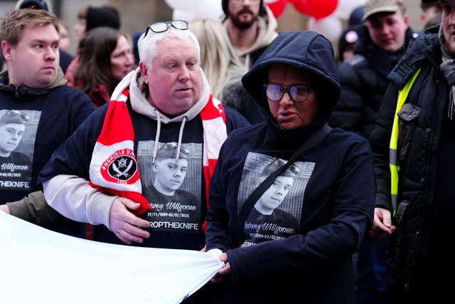 Harvey Willgoose’s parents Mark (left), and Caroline Willgoose led the march through Sheffield (Mike Egerton/PA)