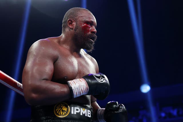 <p>Derek Chisora, with a cut and blood on his face, looks on while fighting Otto Wallin</p>