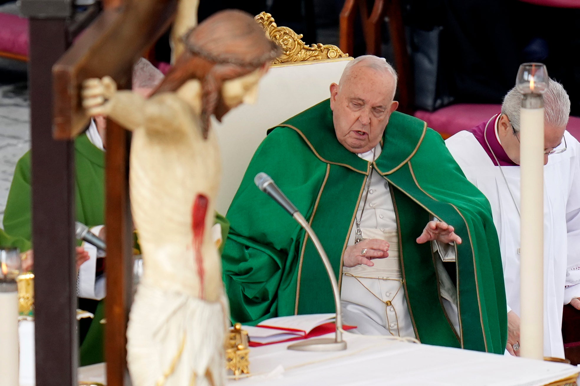 Pope prays as he presides over a mass for the jubilee of the armed forces in St. Peter's Square at The Vatican, Sunday Feb.9, 2025. (AP Photo/Alessandra Tarantino)