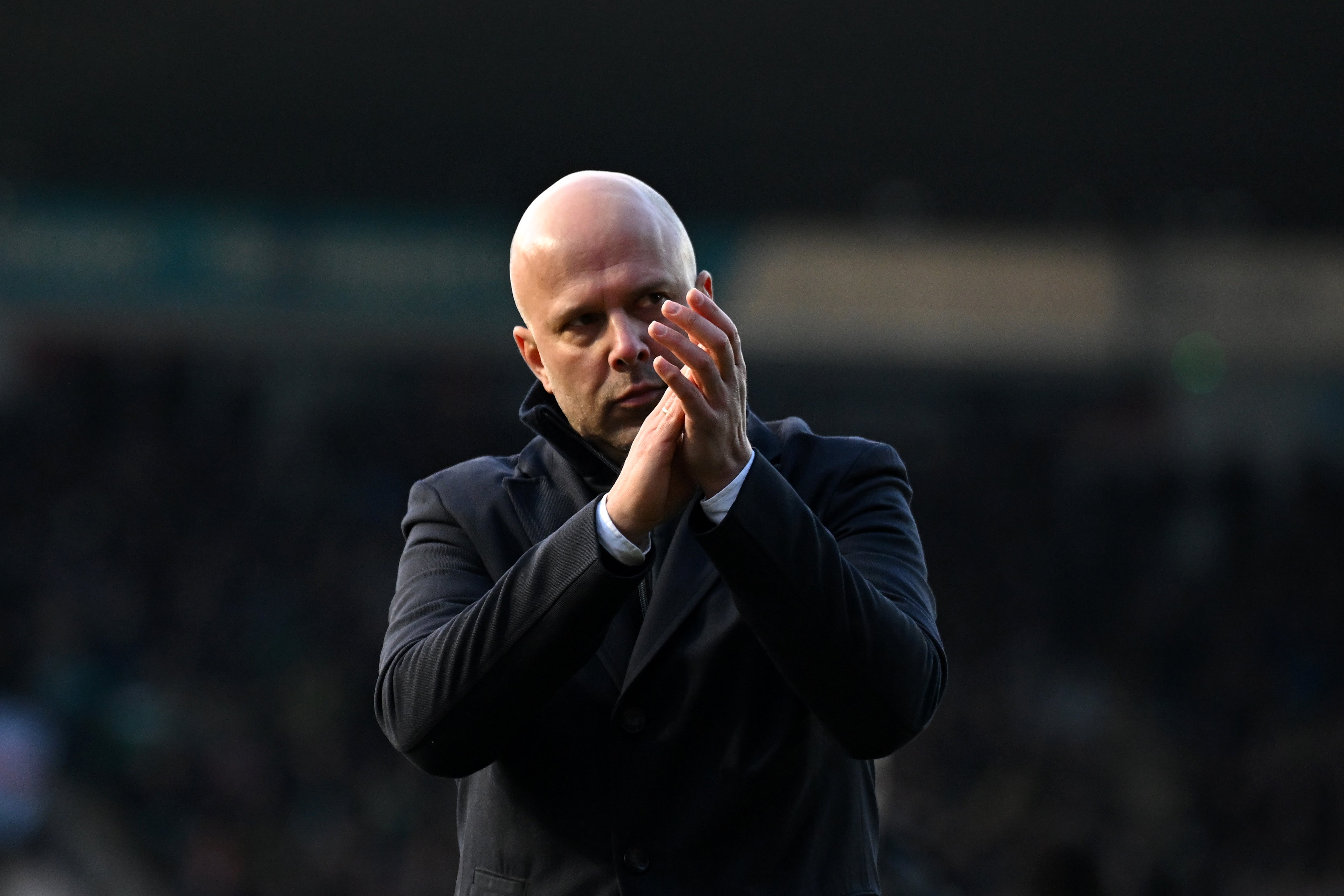 Arne Slot applauds the travelling Liverpool fans