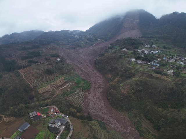 <p>An aerial drone photo shows the site of a landslide in Jinping Village, Junlian County in the city of Yibin, southwest China's Sichuan Province</p>