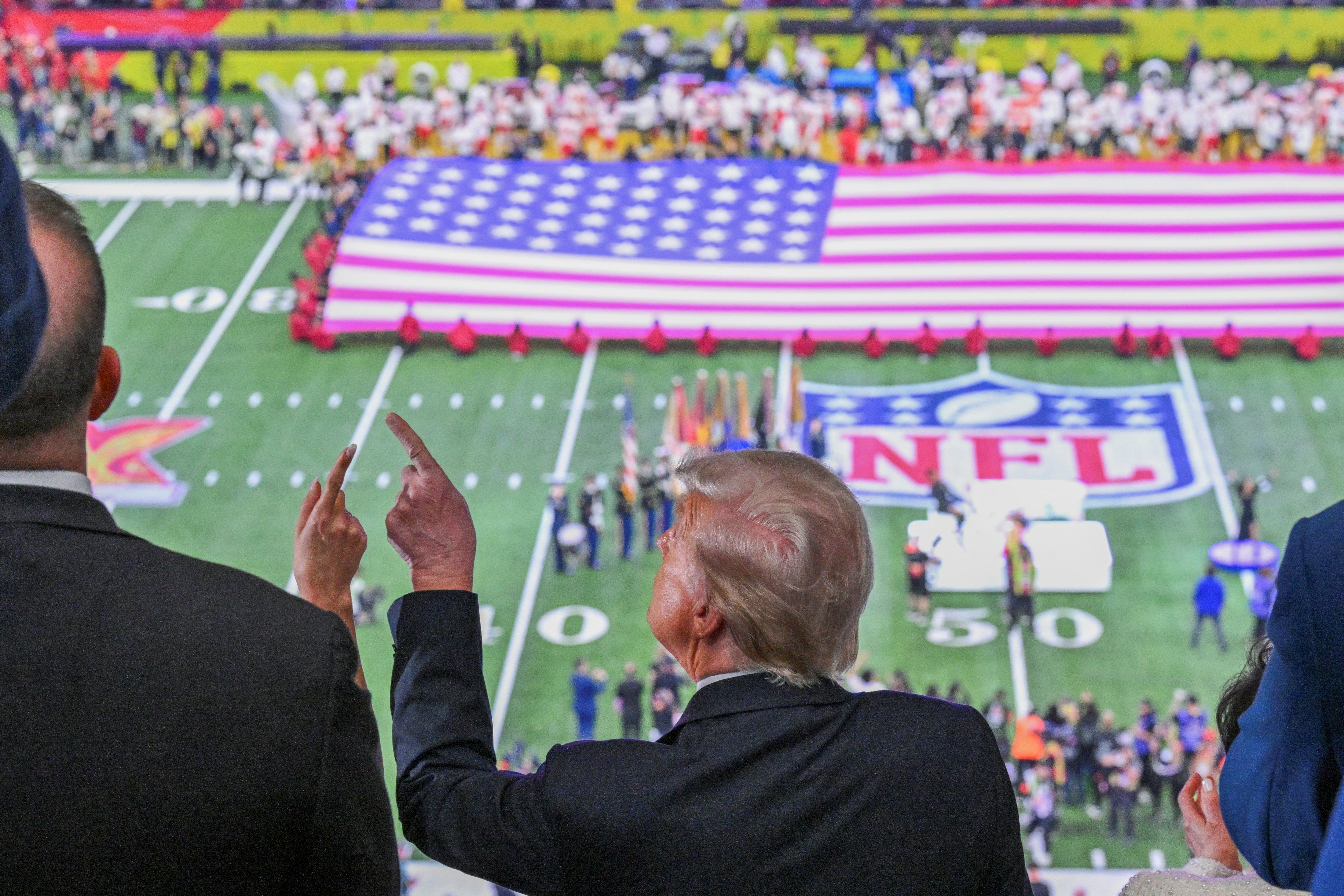 Donald Trump waits for kick-off. He is the first sitting president to attend a Super Bowl