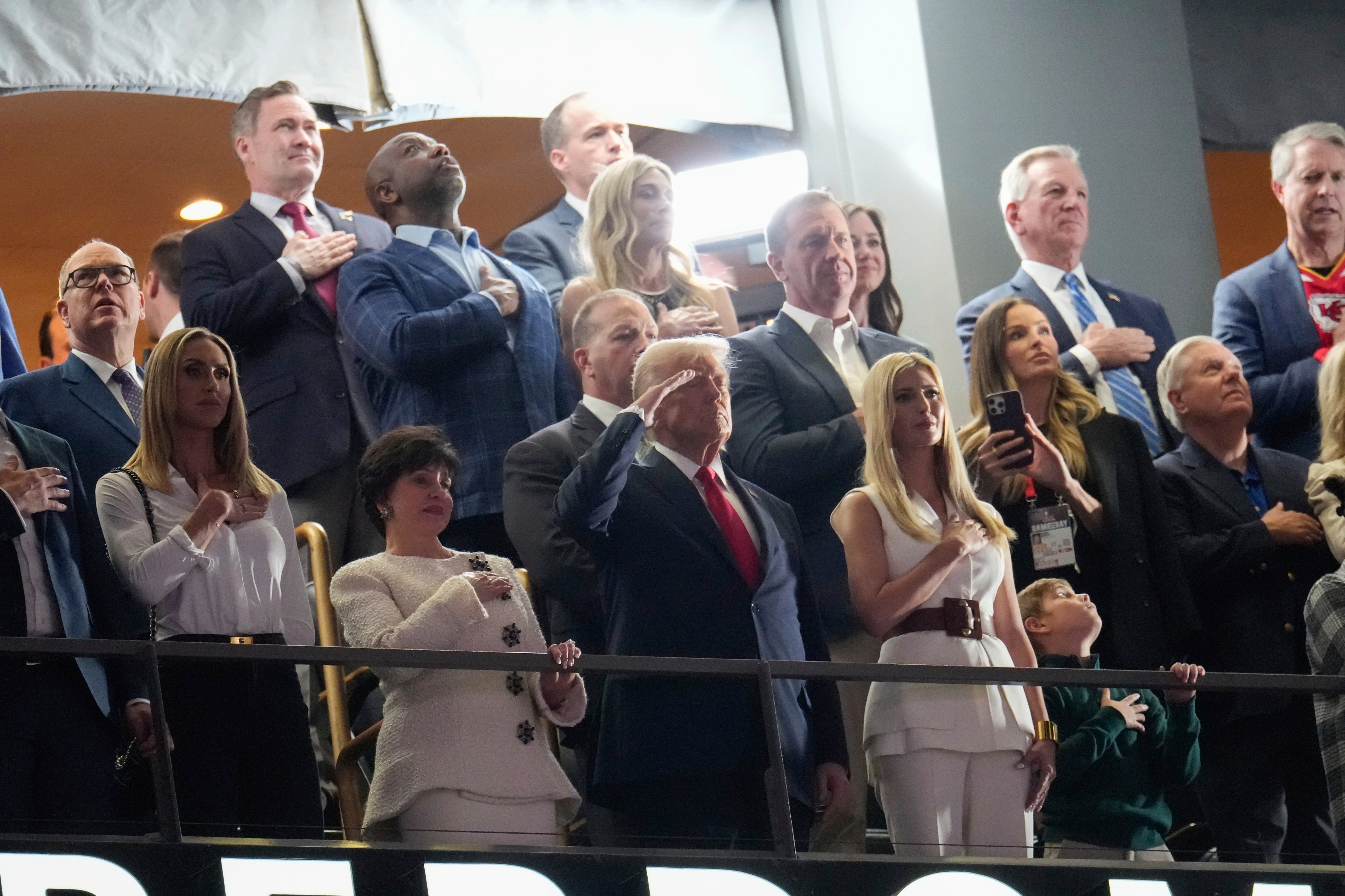 Donald Trump shared a video of Taylor Swift being booed at the Super Bowl that was captioned: ‘The world is healing’