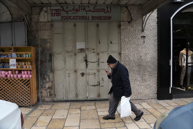 <p>The shuttered Educational Bookshop in East Jerusalem, pictured after an Israeli police raid</p>