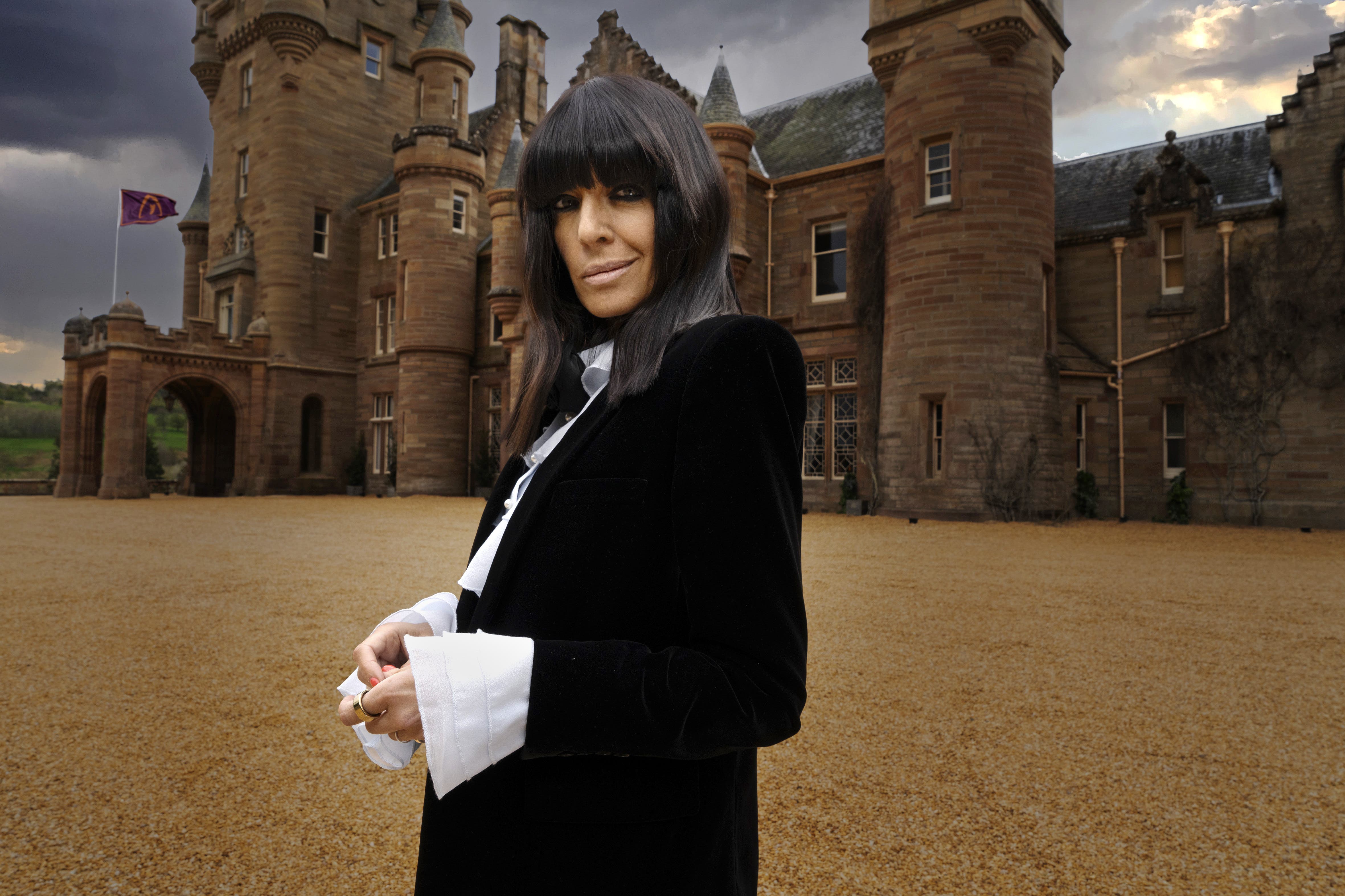 ‘The Traitors’ host Claudia Winkleman in front of the castle in the Scottish Highlands where the series is filmed