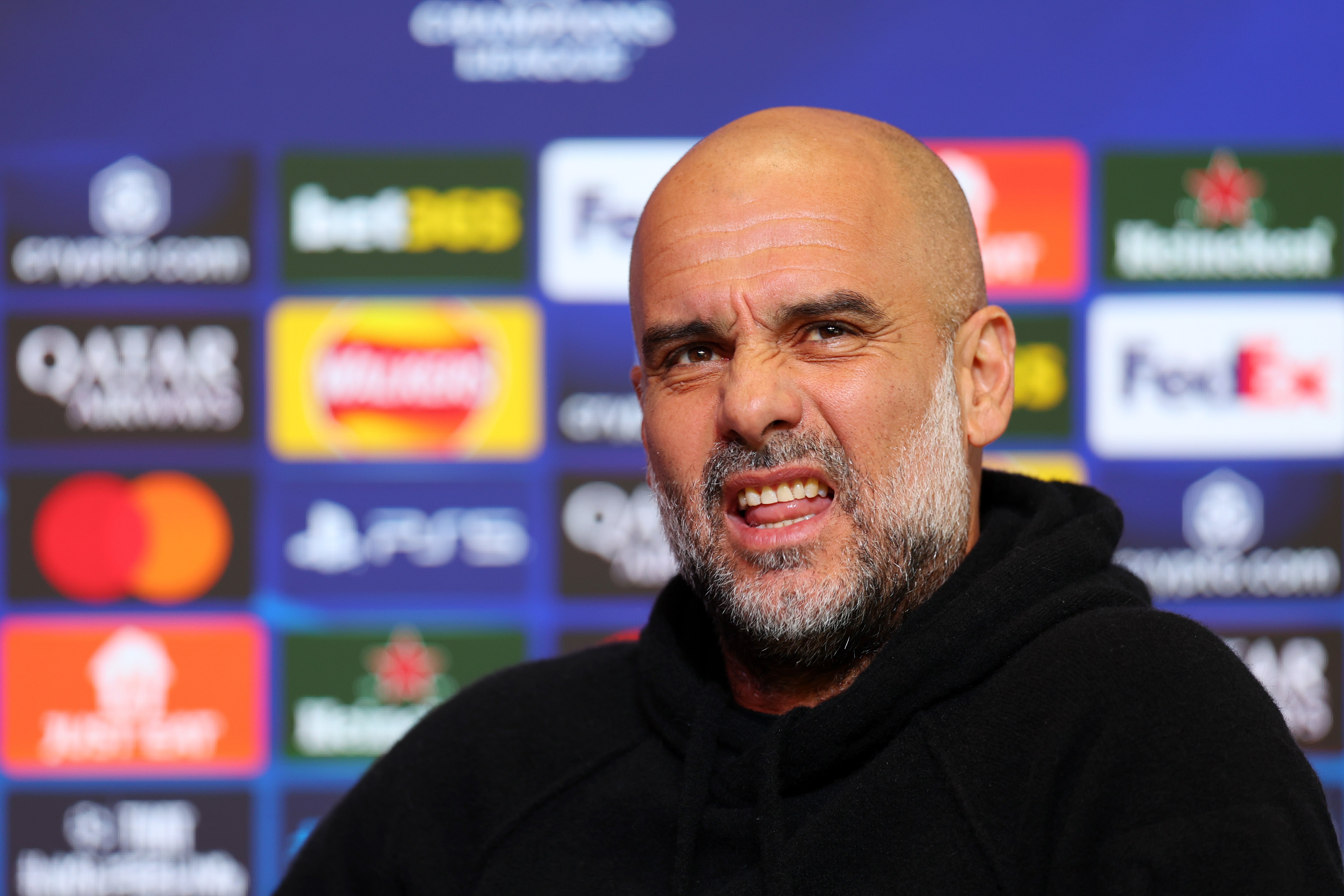 Pep Guardiola speaks to the media ahead of Manchester City's tie with Real Madrid