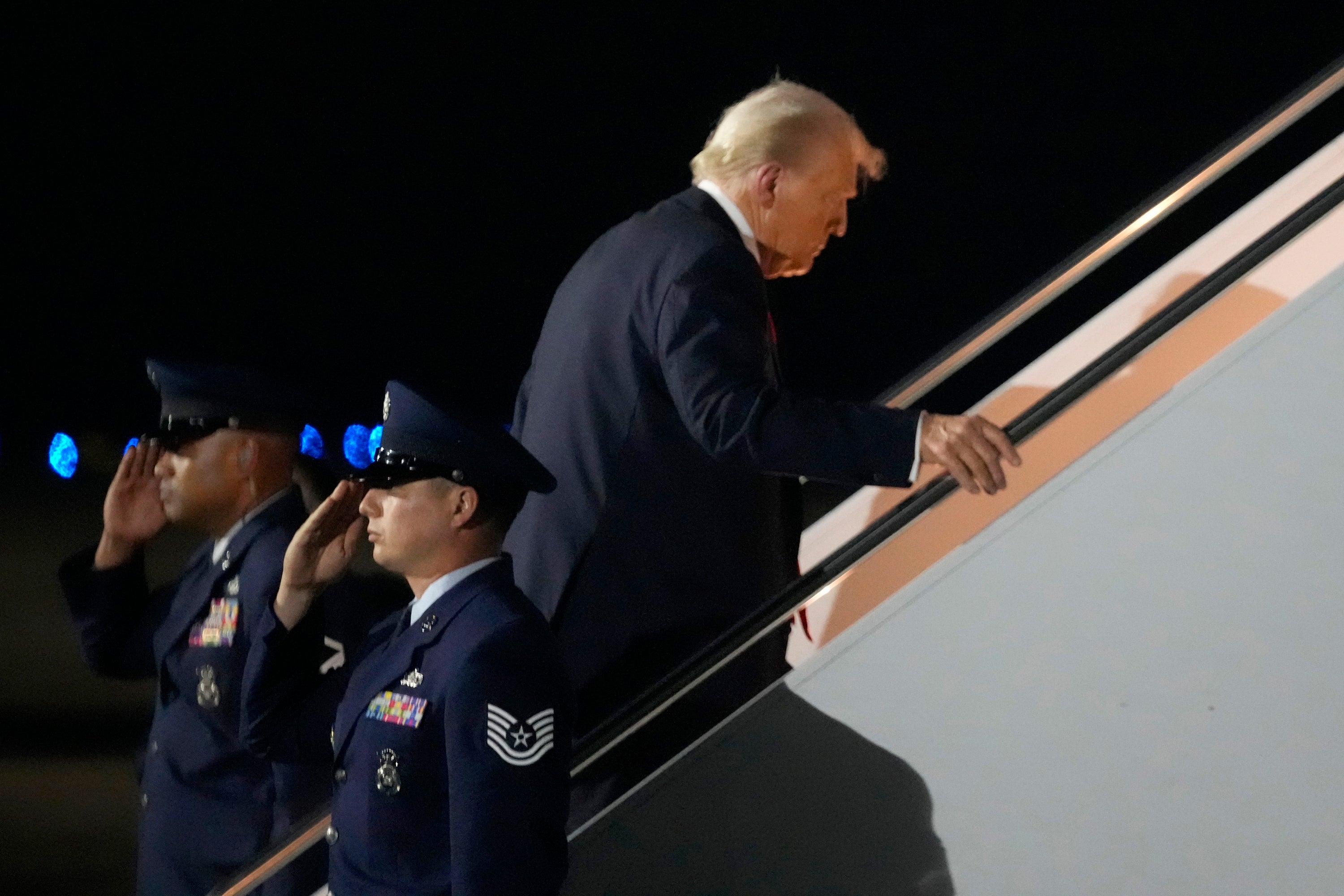 The president was pictured getting back onboard Air Force One more than an hour before the conclusion of the Big Game