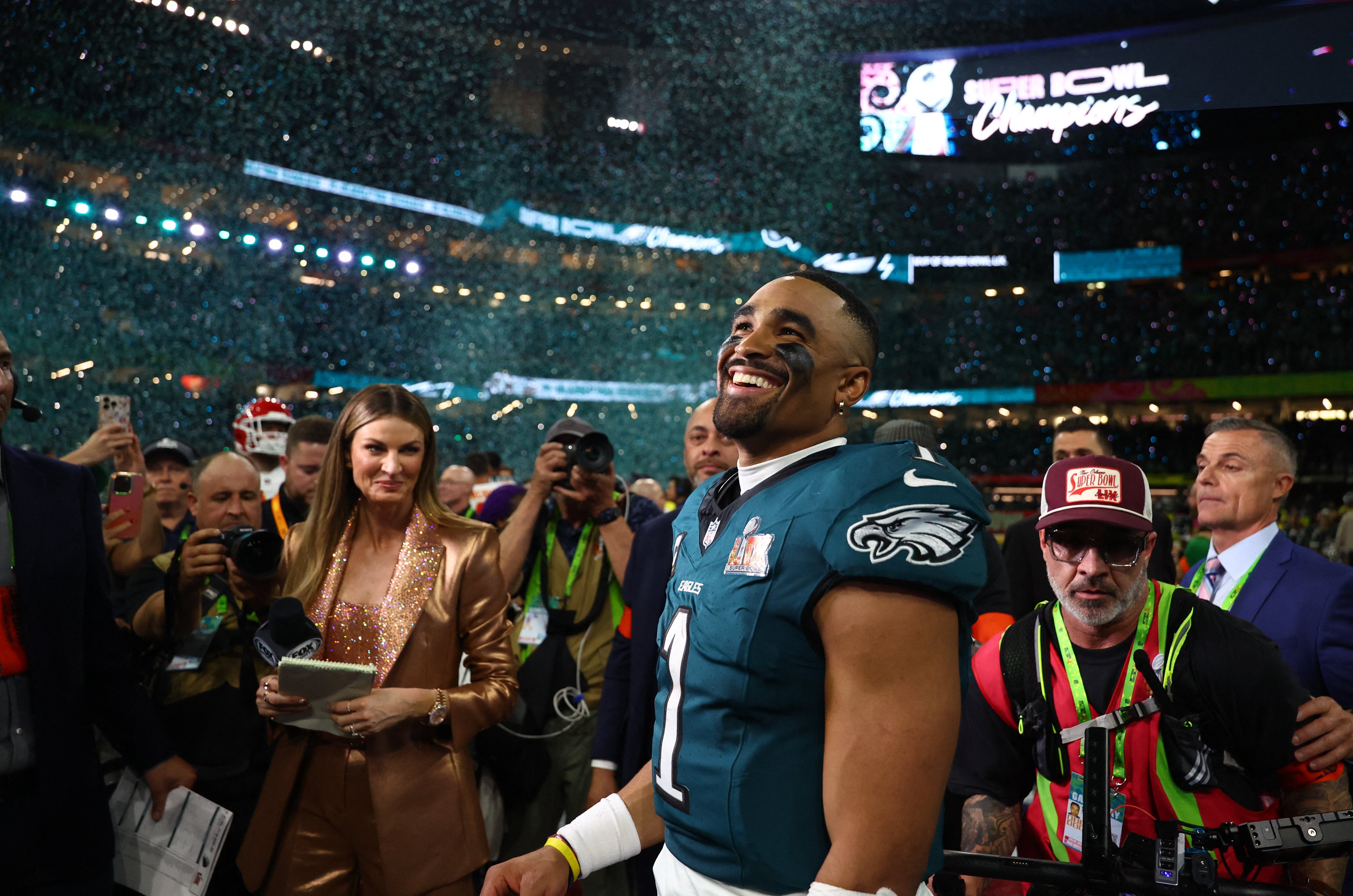 <p>Philadelphia Eagles quarterback Jalen Hurts (1) celebrates after defeating the Kansas City Chiefs in Super Bowl LIX</p>