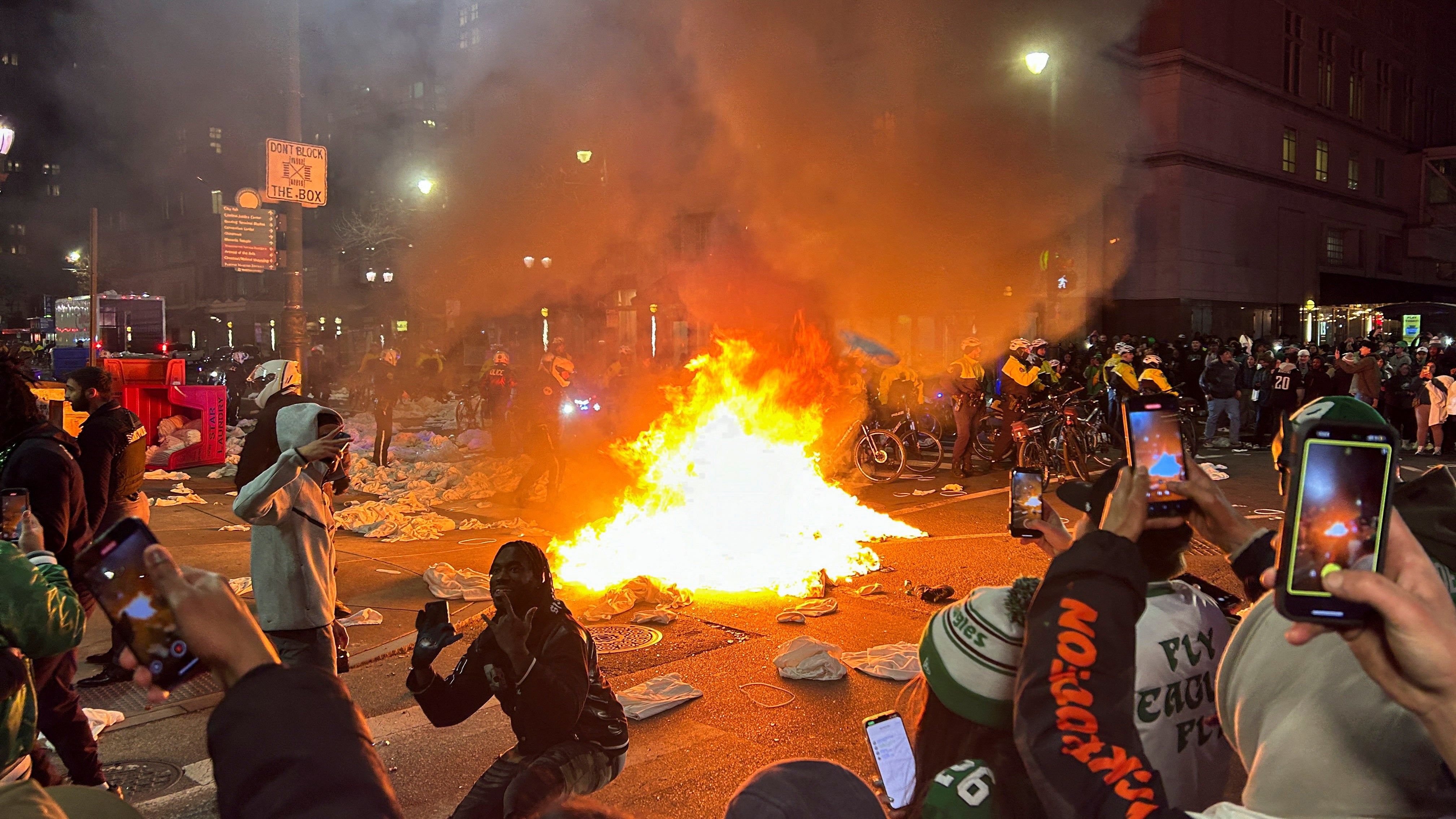 A fire is started in Philadelphia by fans as they celebrate the Eagles’ second Super Bowl title