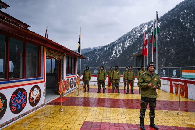 <p>File. Indian soldiers stand guard at the Jaswant Garh war memorial in Tawang, Arunachal Pradesh</p>