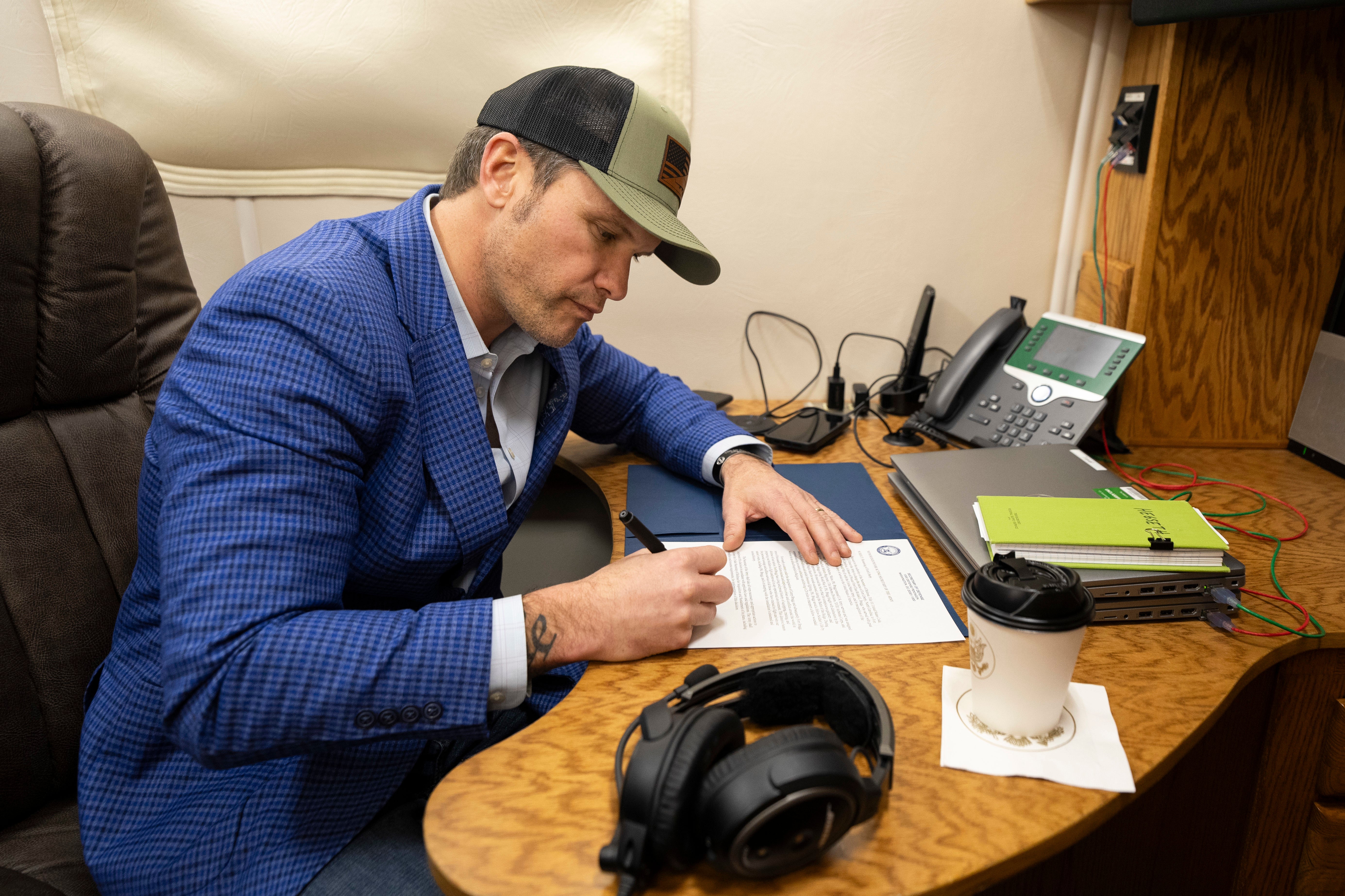 Defense Secretary Pete Hegseth signs a document re-naming Fort Liberty back to Fort Bragg - but this time honoring a different person