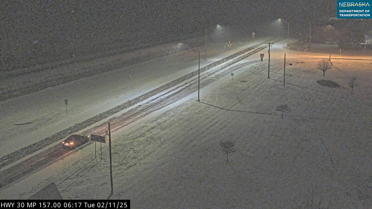 Snow fell on Nebraska roads early Tuesday morning. Forecasters warned the storm could make travel dangerous