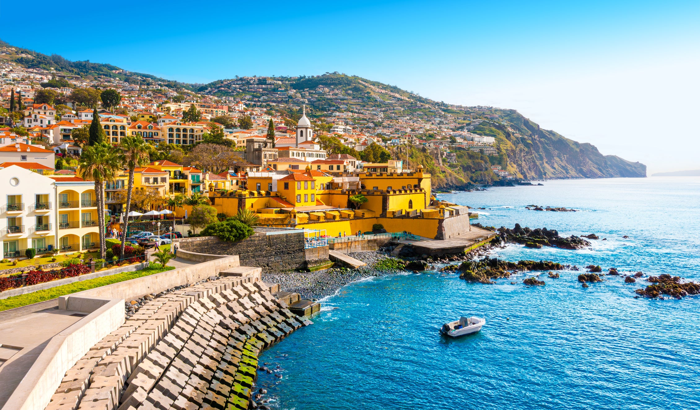 Madeira’s capital Funchal overlooks the twinkly blue of the Atlantic Ocean