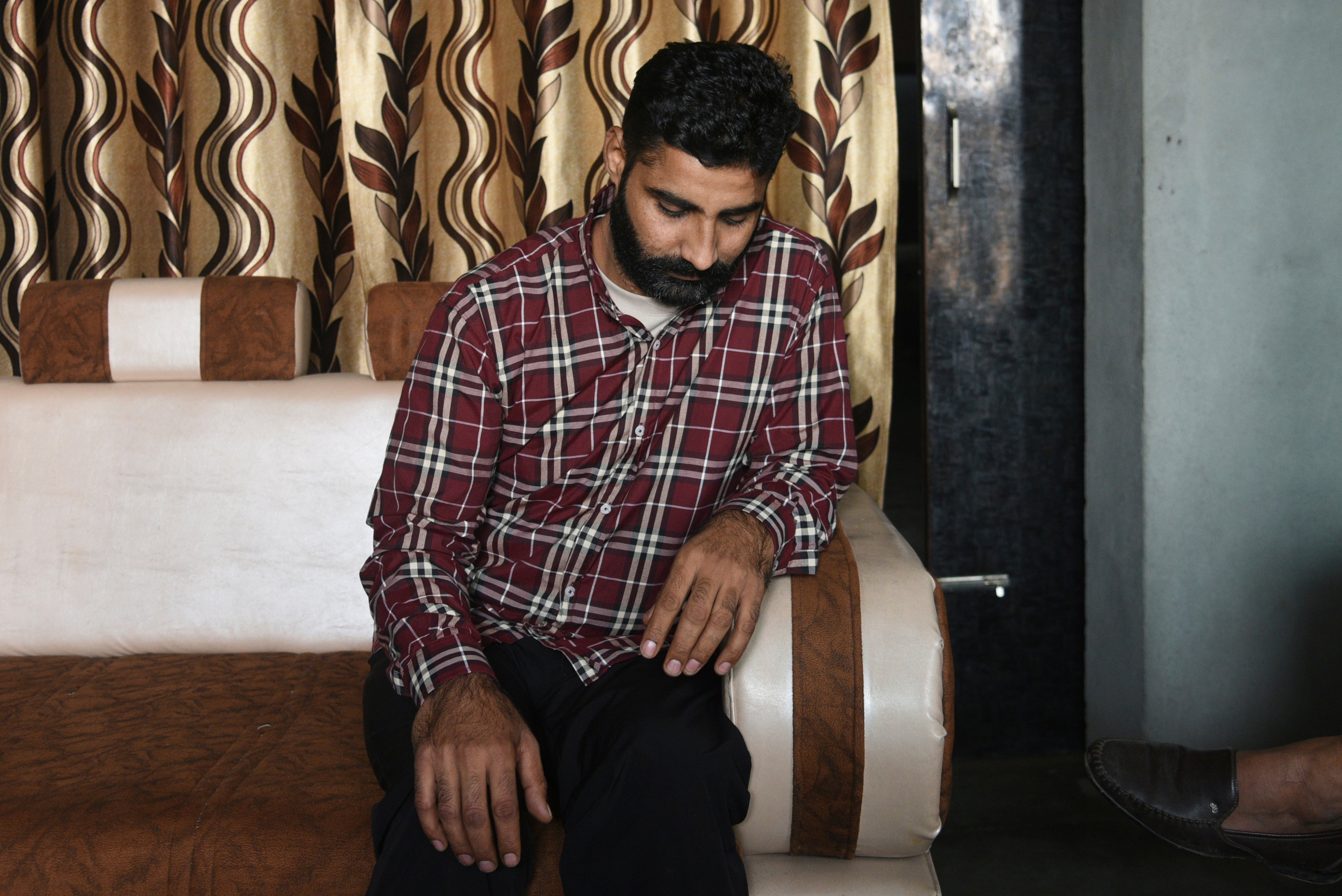 File. Jaspal Singh, 36, an Indian immigrant deported from the US talks to relatives upon his return to Amritsar, India, on 6 February 2025