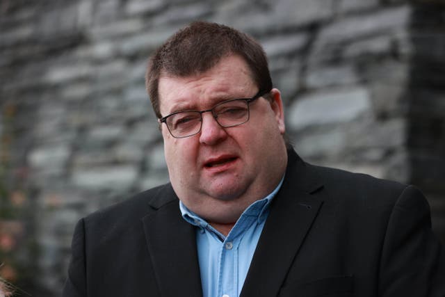Omagh bombing survivor Garry McGillion speaking to the media outside at the Strule Arts Centre in Omagh, Co Tyrone (Liam McBurney/PA)