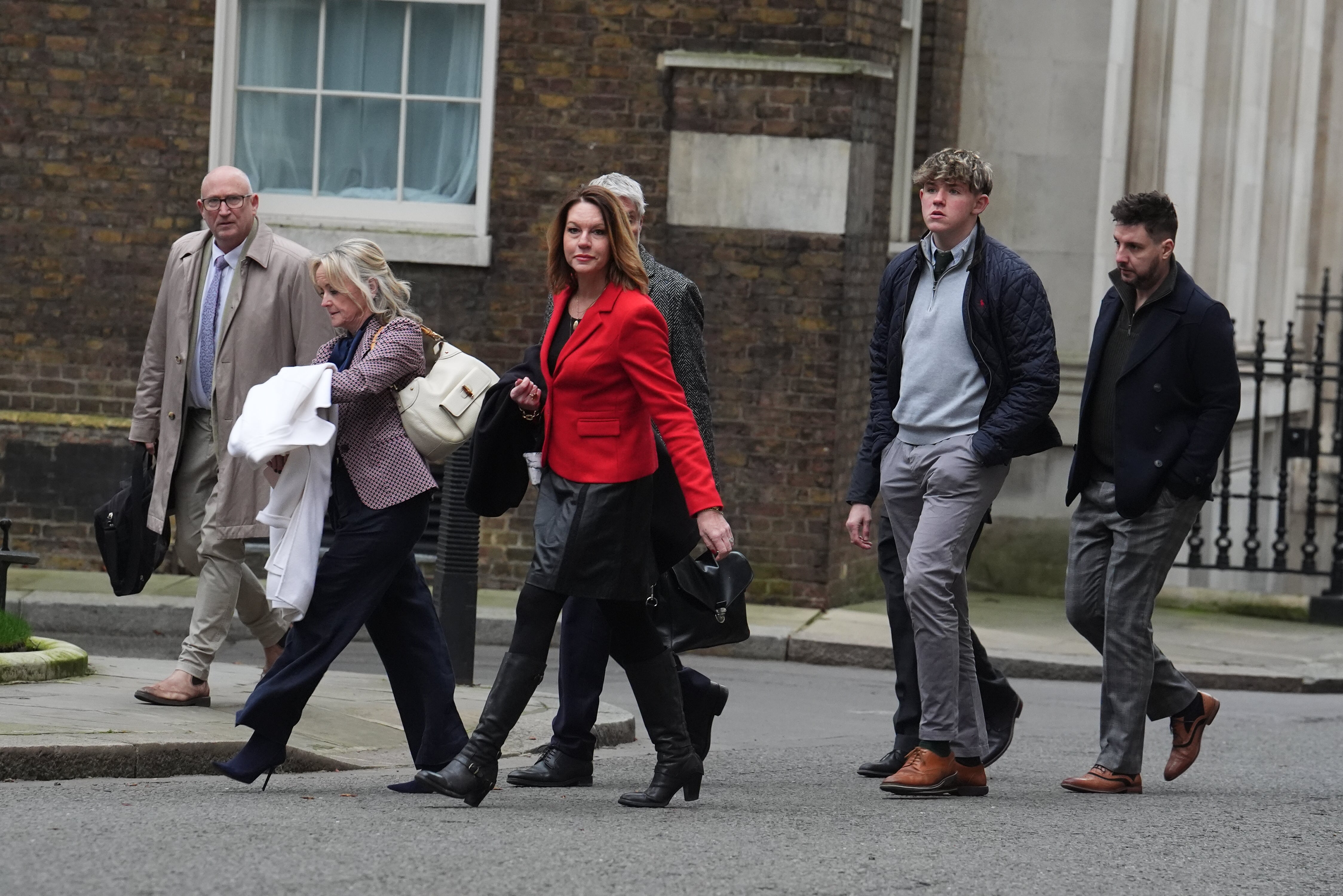 Families of Barnaby Webber, Grace O'Malley Kumar and Ian Coates arrive at Downing Street