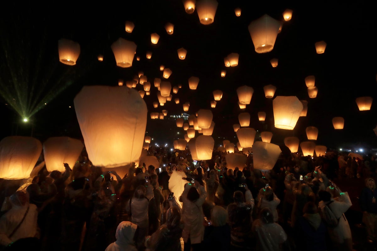 Thousands in Taiwan and China celebrate the Lantern Festival with high hopes and rice dumplings