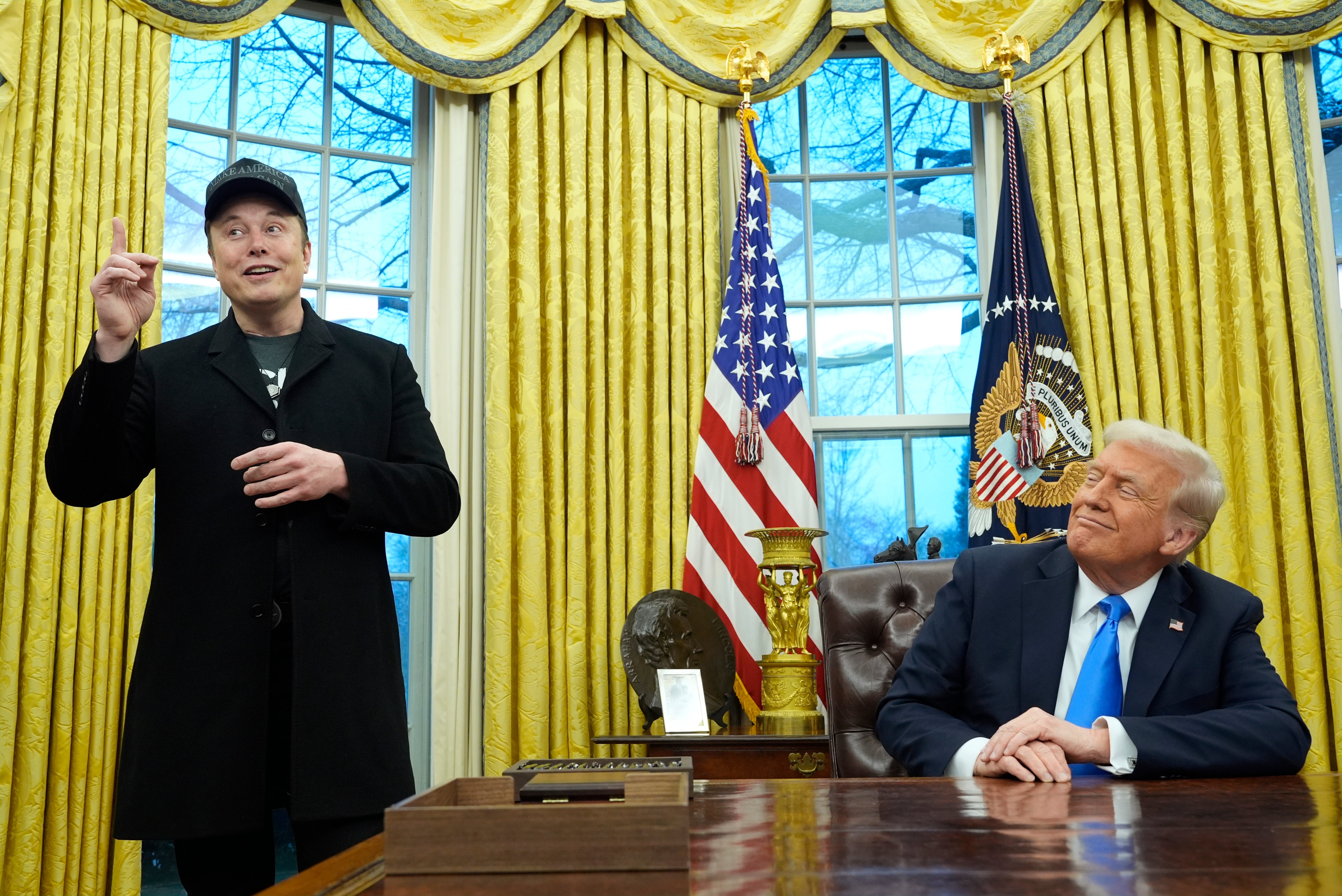 Musk (left), the head of DOGE, and President Trump pictured in the White House on Tuesday