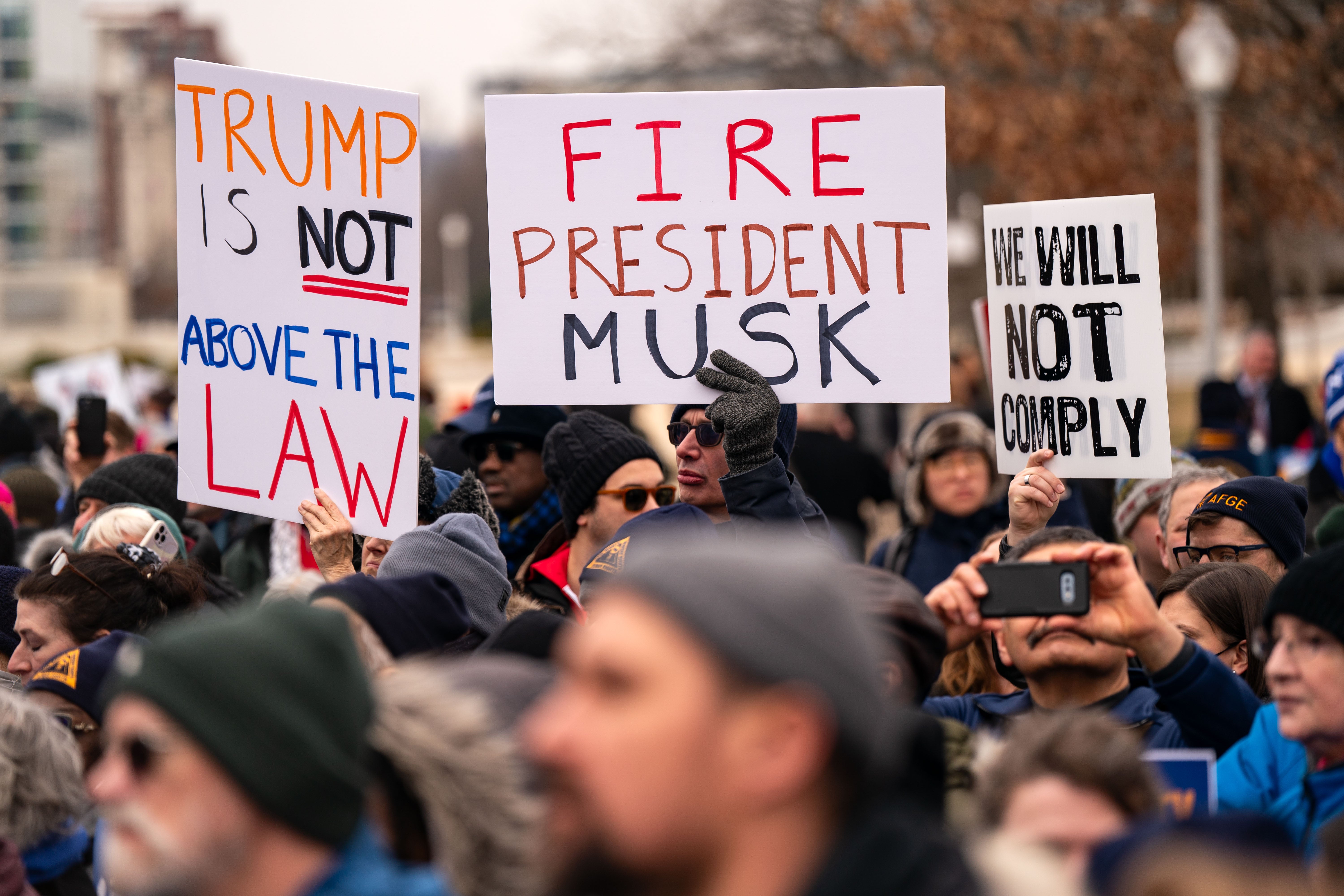 People in Washington, D.C. rally in support of civilian federal workers on February 11