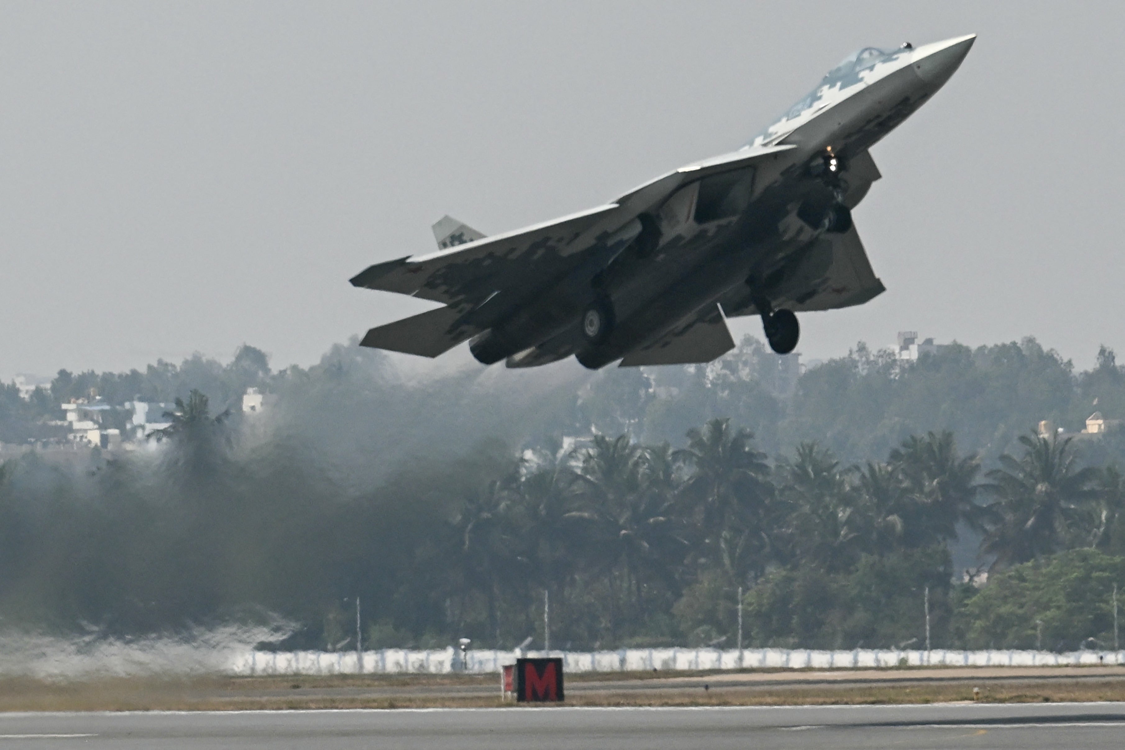 A Russian Sukhoi Su-57 fifth-generation combatant  craft  takes disconnected  during the inaugural time  of the 15th variation  of 'Aero India 2025'