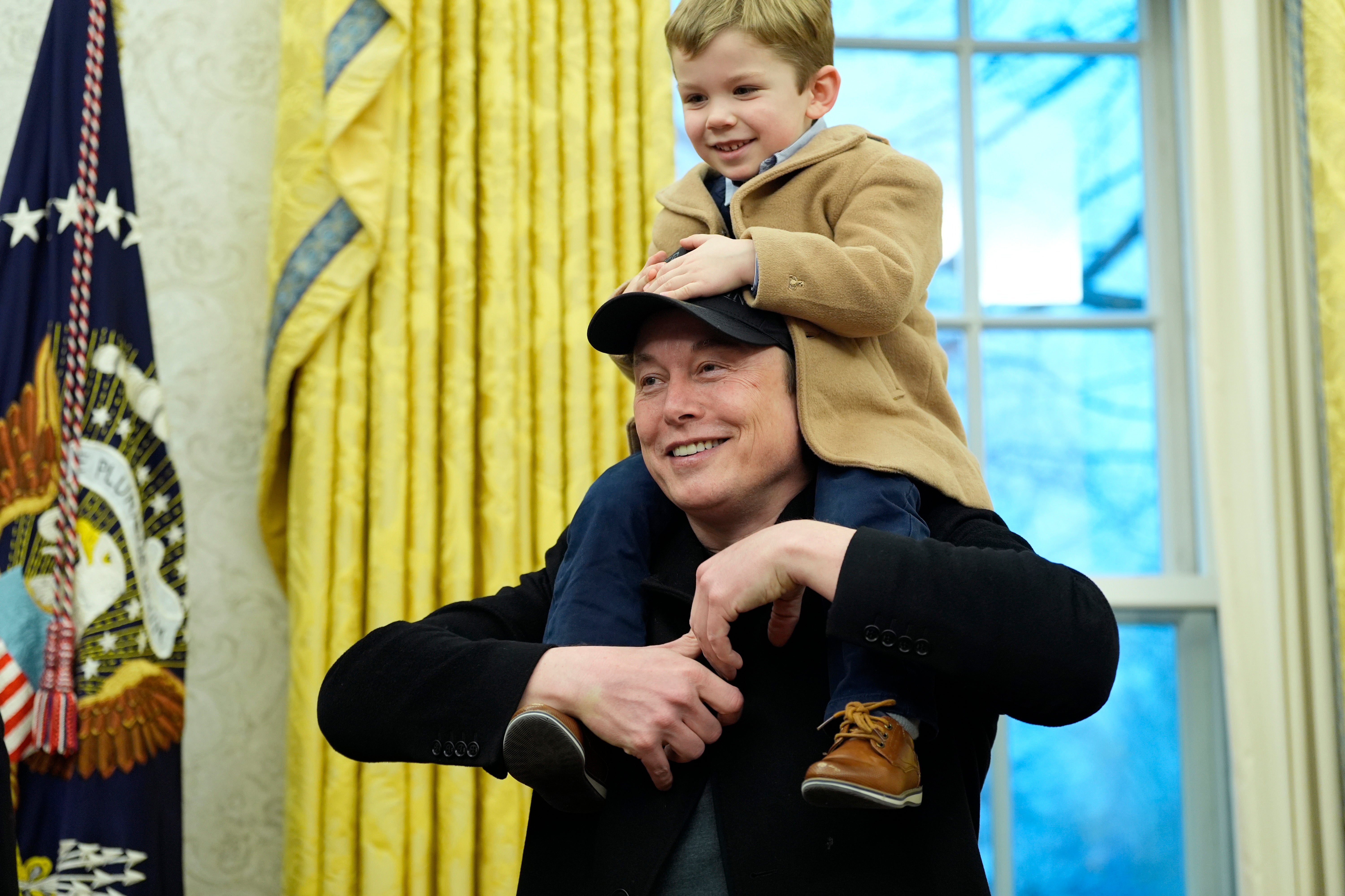 Elon Musk, joined by his son X Æ A-Xii, speaks in the Oval Office. Musk’s own dad didn’t hold back saying the world’s richest man ‘hasn’t been a good father’