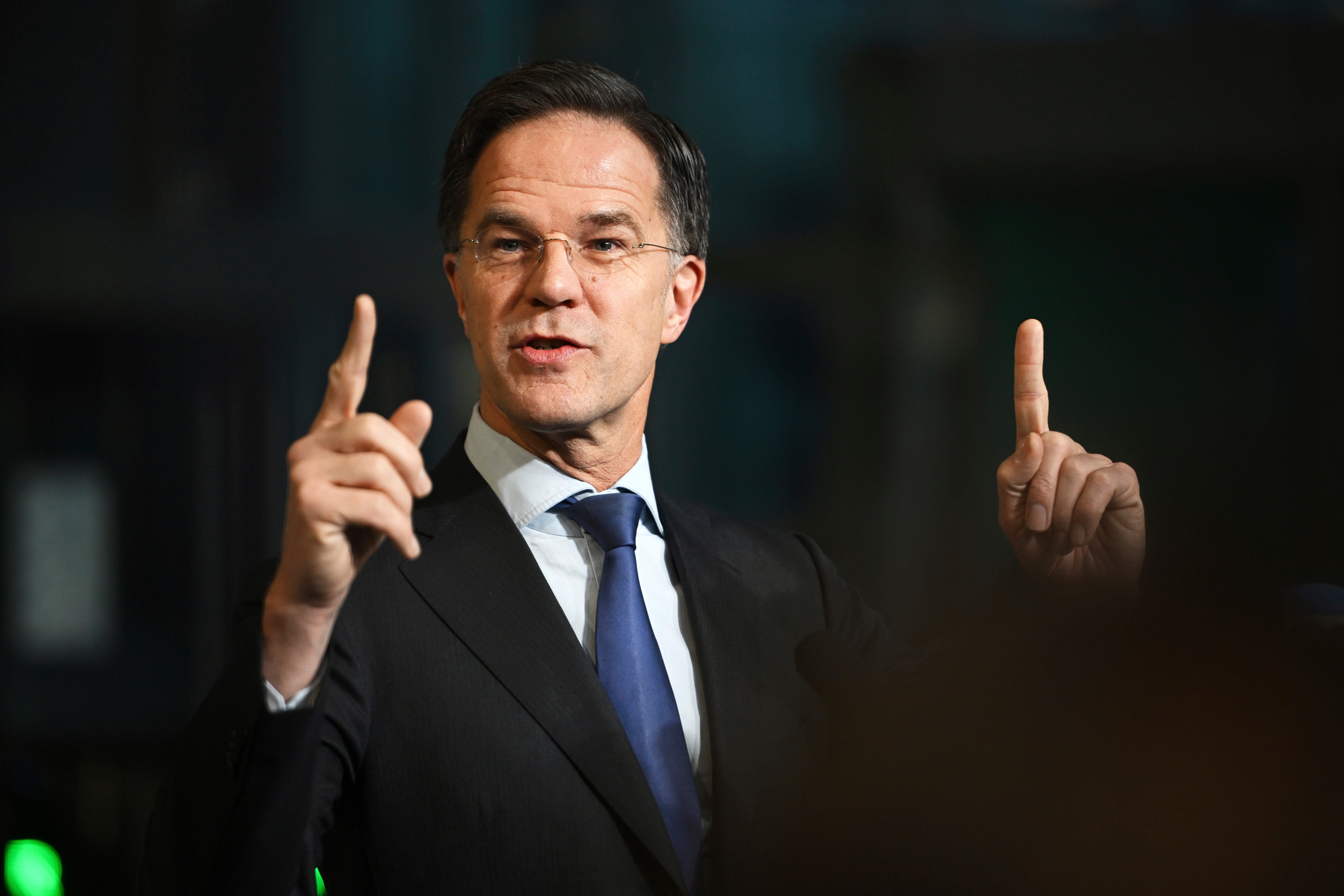 NATO Secretary General Mark Rutte speaks with the media as he arrives for a meeting of NATO defense ministers