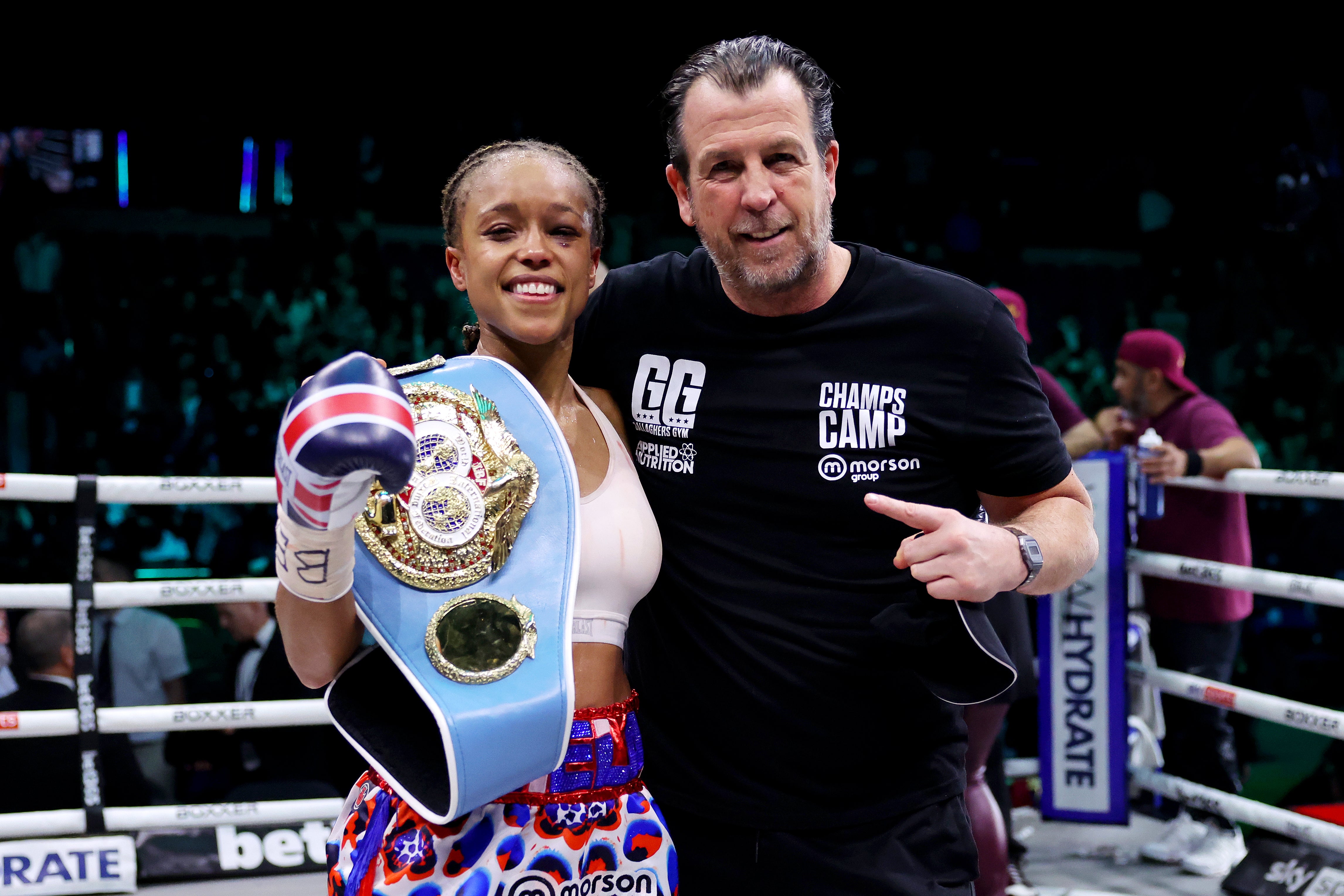 Joe Gallagher with women's world champion Natasha Jonas in 2024