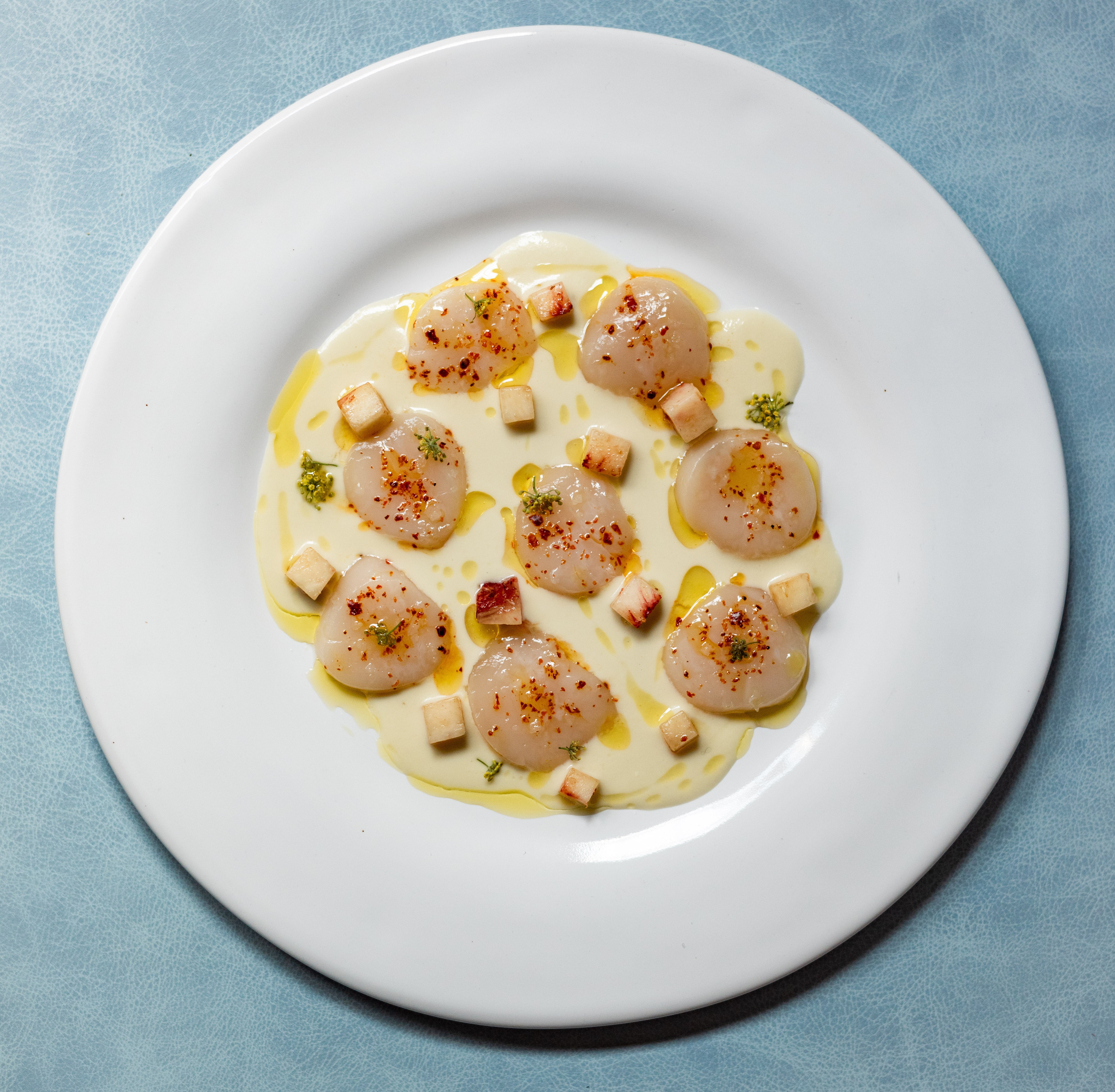 A dish that started as a Christmas tradition and made its way onto the Wildflowers menu – Aaron Potter’s scallop crudo is a simple yet elegant expression of fresh flavours