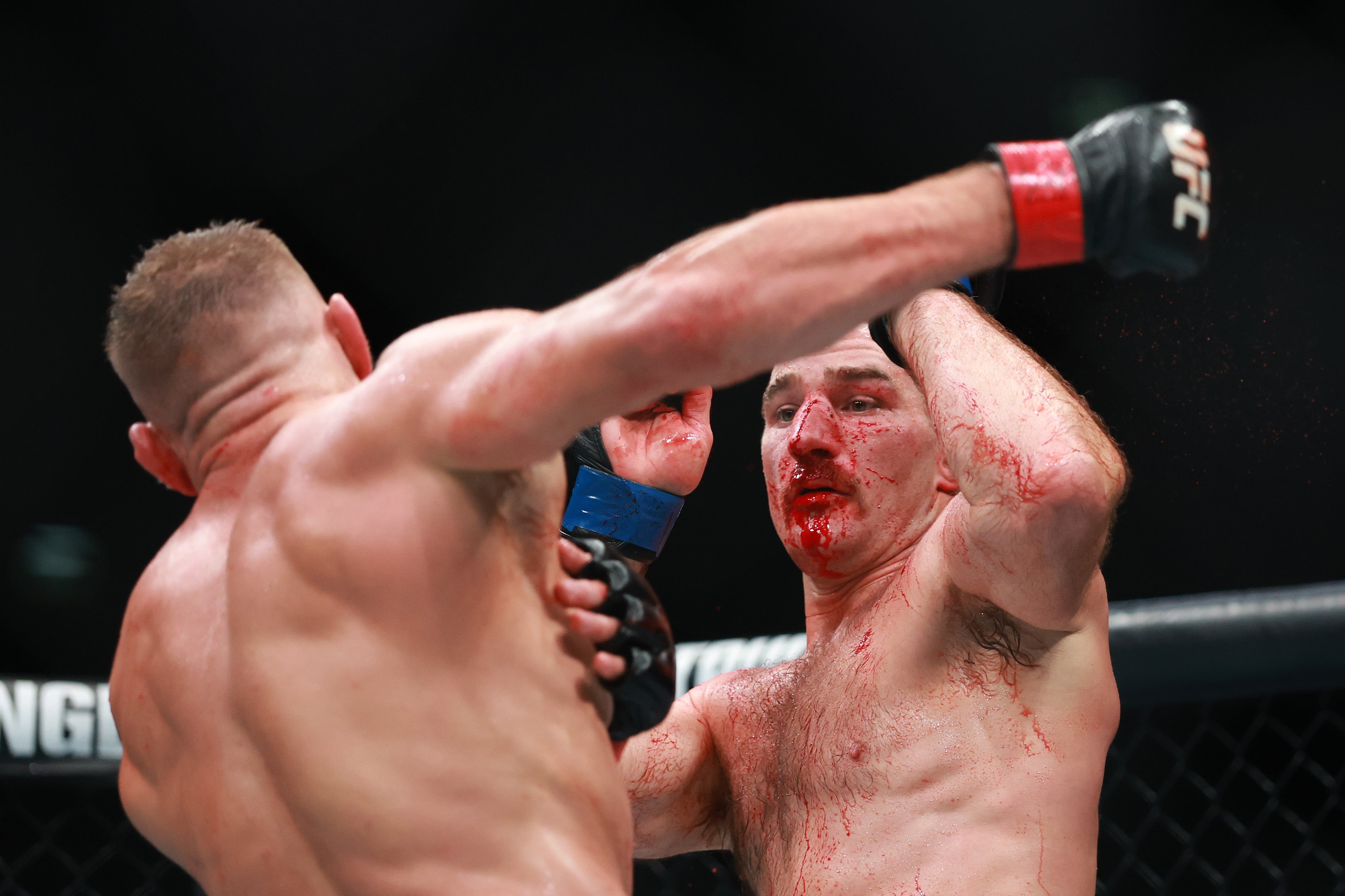 Sean Strickland (right) during his second loss to Dricus Du Plessis