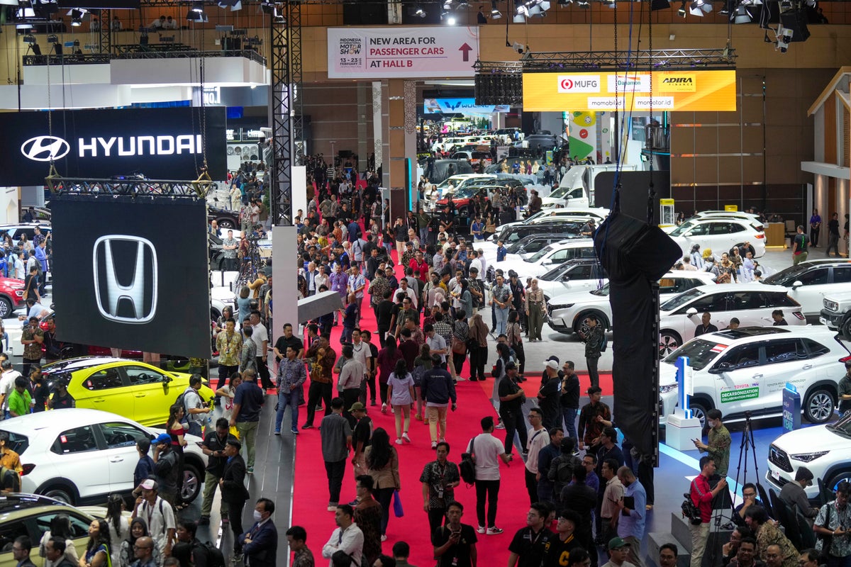 Electric cars and motorbikes star at Indonesia’s motor show despite country’s slow uptake