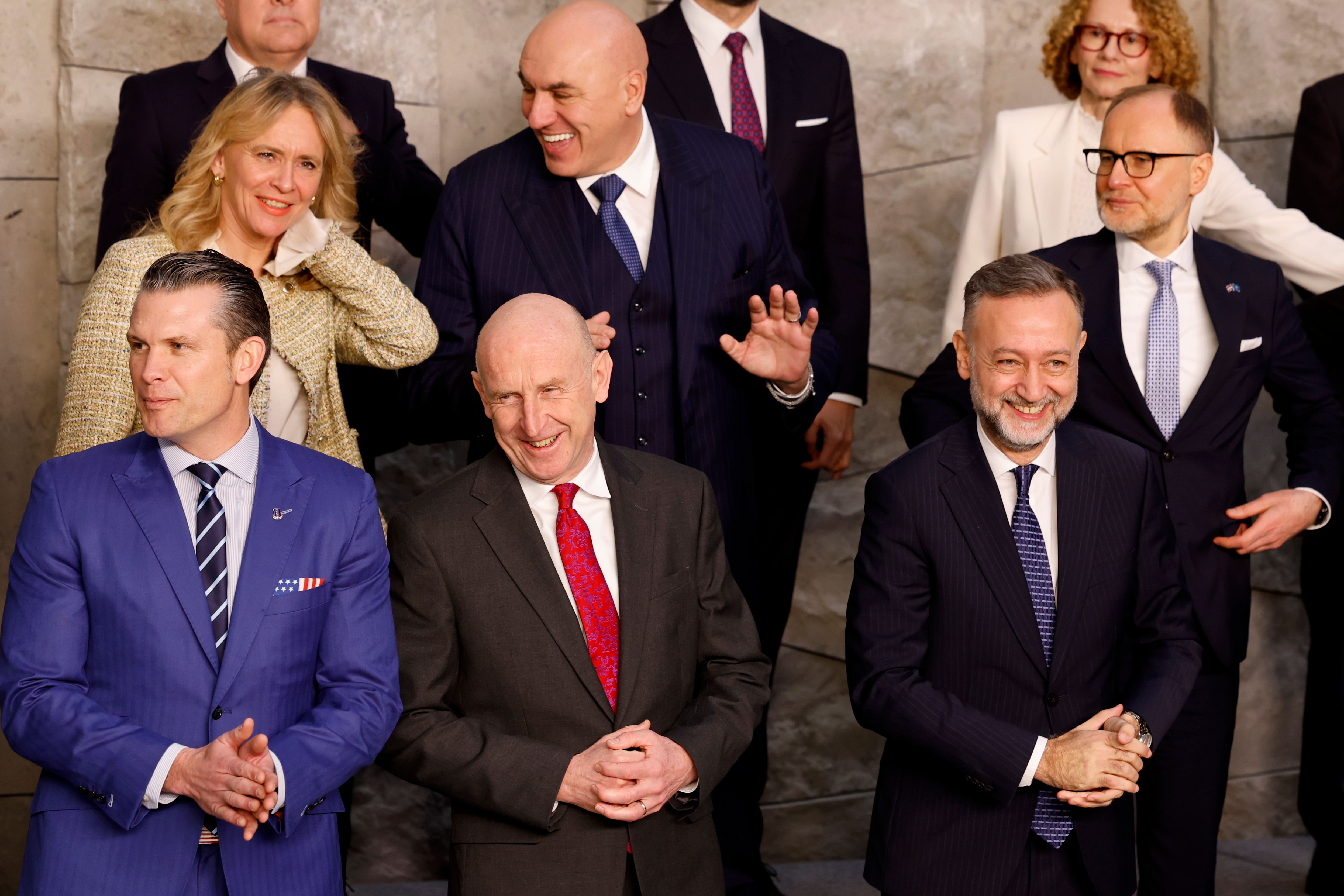 John Healey, centre, with United States secretary of defence Pete Hegseth, front left, in Brussels (Geert Vanden Wijngaert/PA)