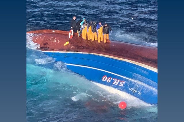 The crew took refuge on the vessel’s side after it capsized, but it quickly sank (SAR helicopter/MAIB/PA)