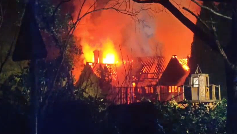 Towering flames engulfed the grand country home and left it as a smouldering ruin