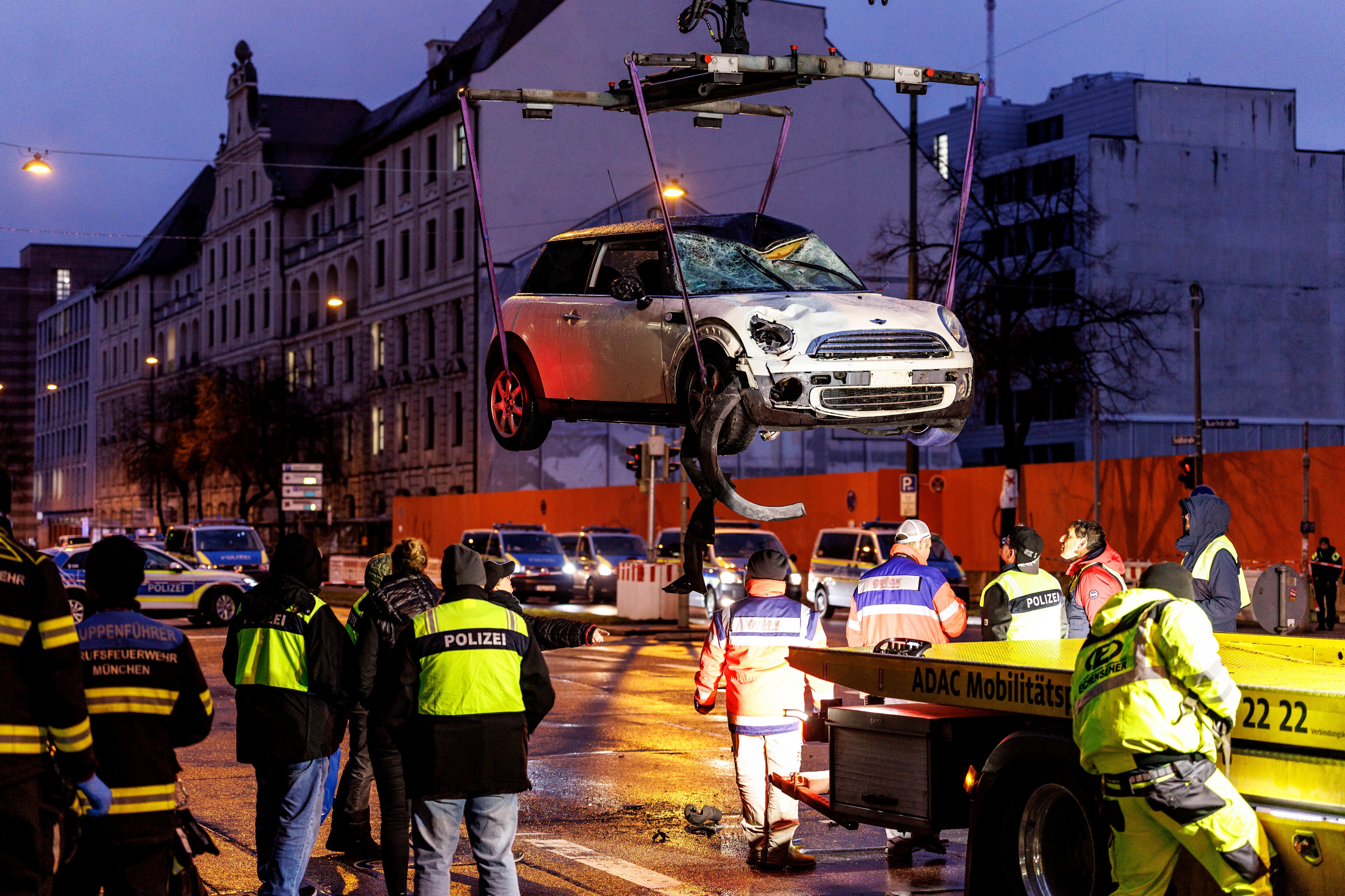 The car was lifted from the street after the attack in the busy area