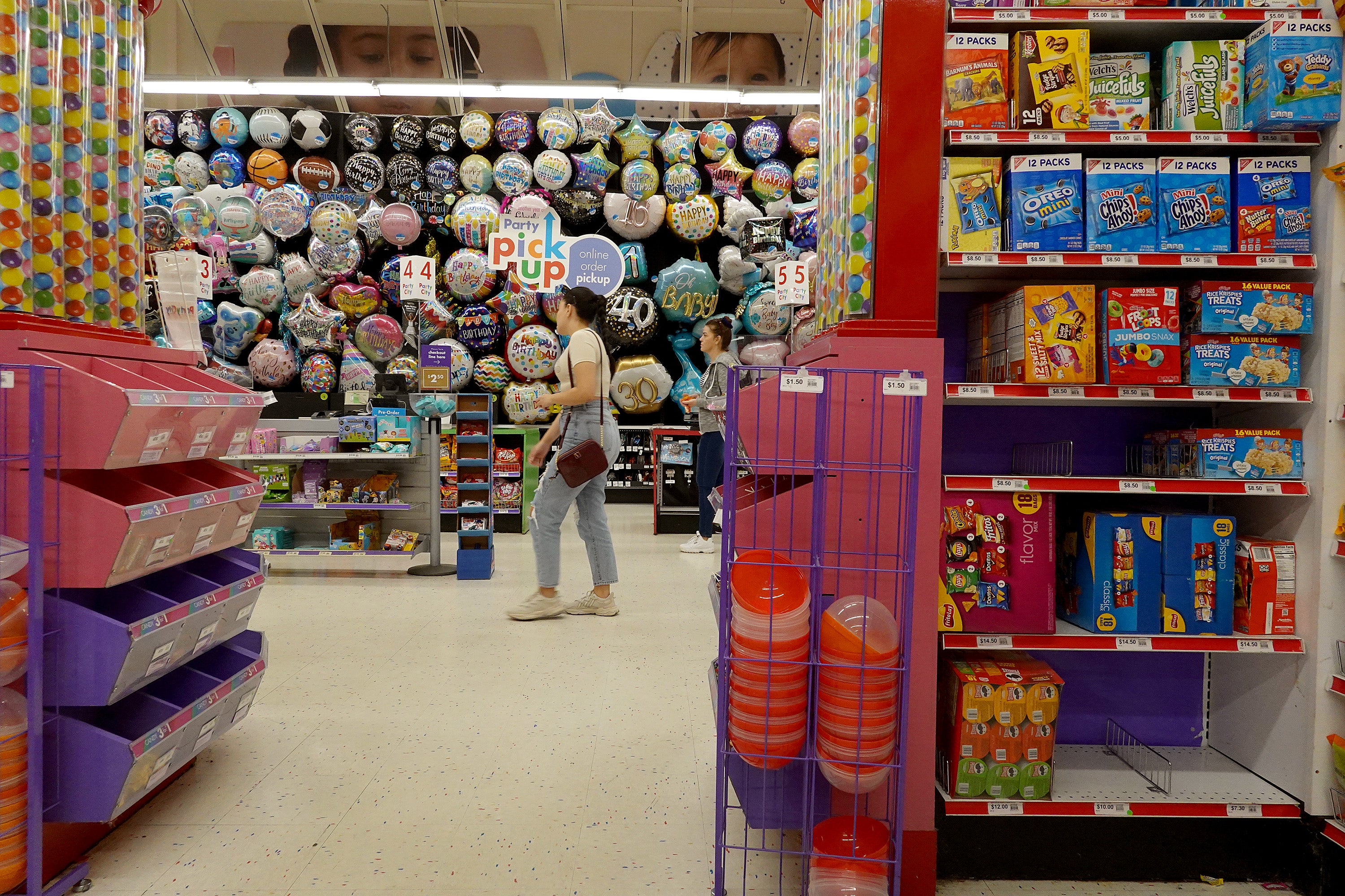 <p>People shop in a Party City store on January 18, 2023 in Miami, Florida</p>